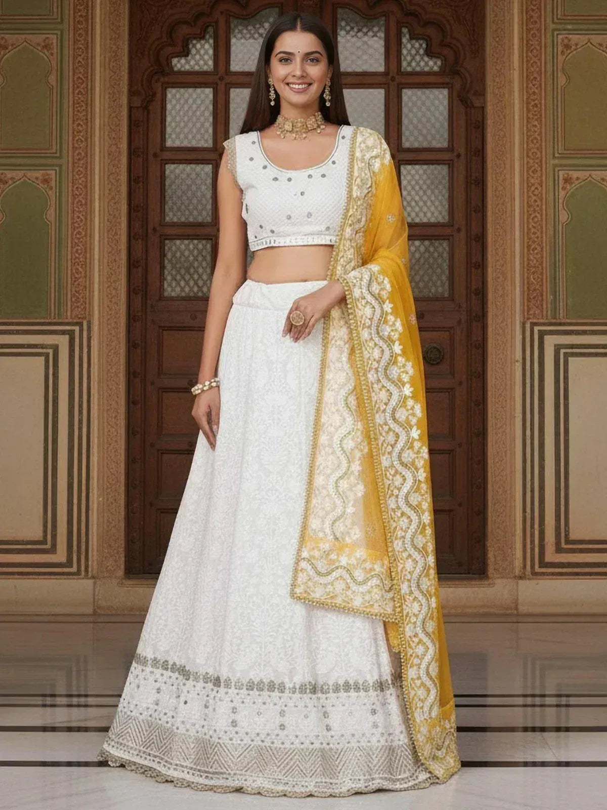 White embroidered lehenga choli with yellow dupatta, Indian ethnic wear for women