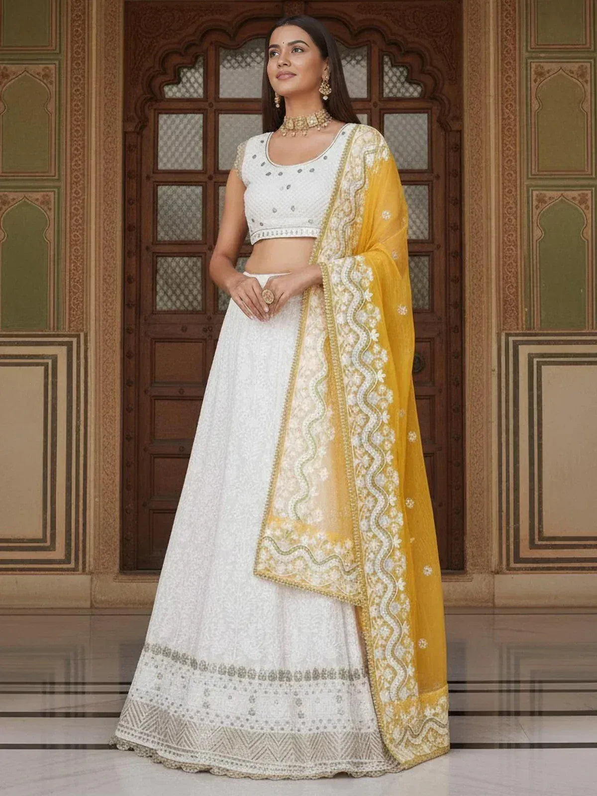 White embroidered lehenga choli with yellow dupatta, Indian ethnic wear for weddings and festivals