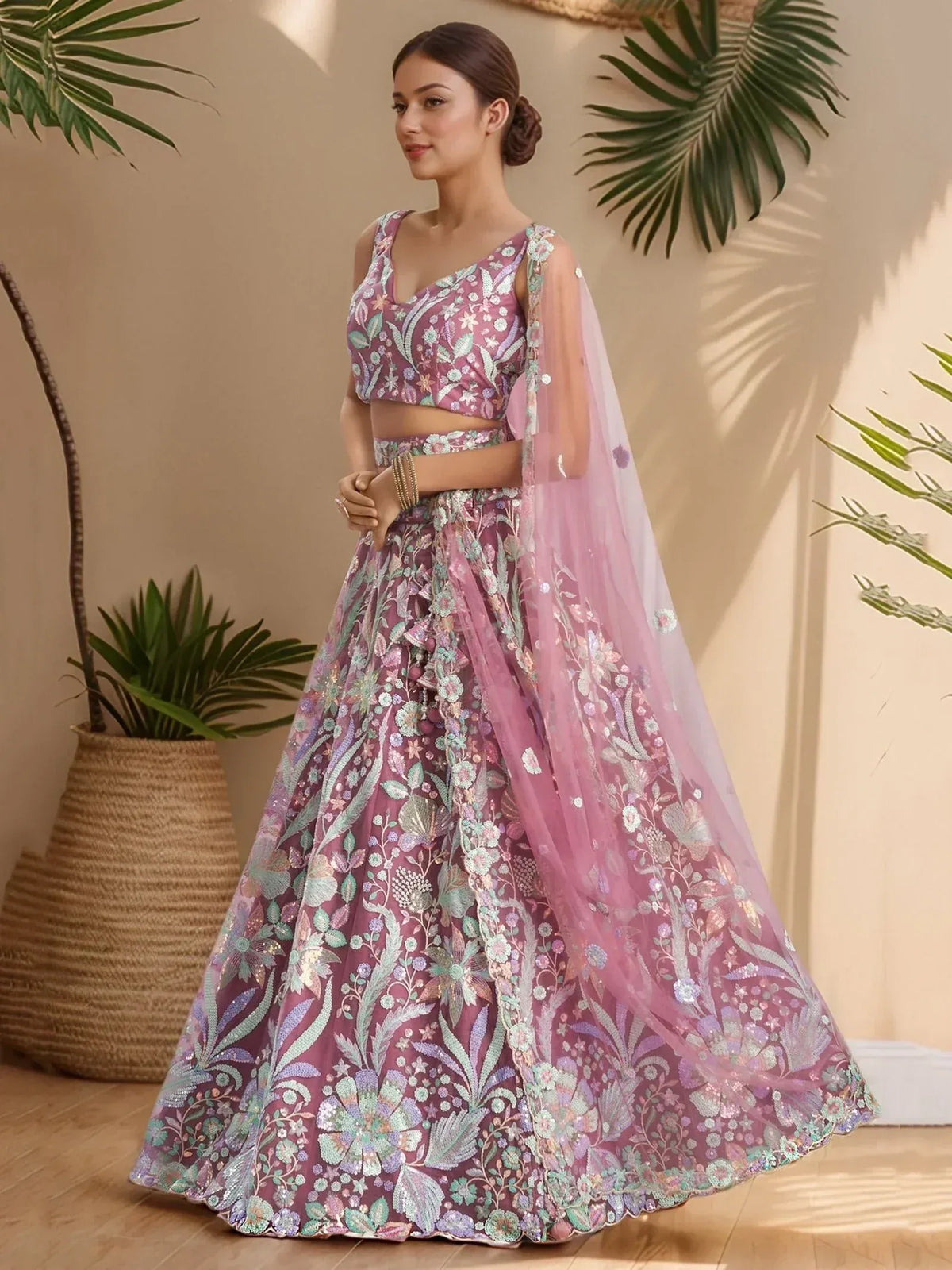 Elegant floral embroidered lehenga choli with sheer dupatta, perfect for Indian ethnic wear