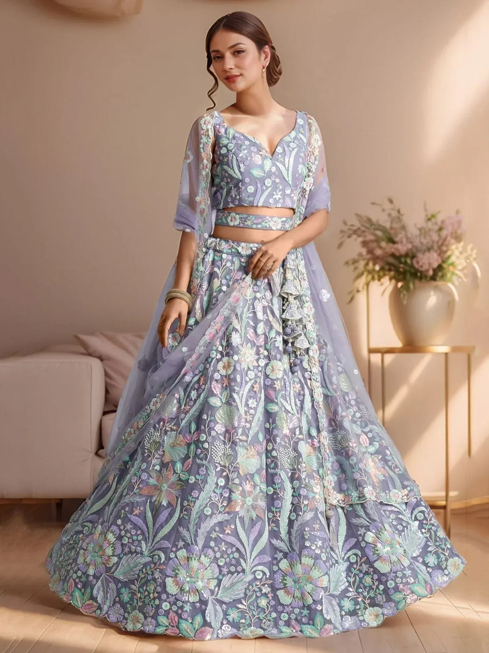 Elegant lavender lehenga choli with floral embroidery, perfect for Indian ethnic wear occasions.