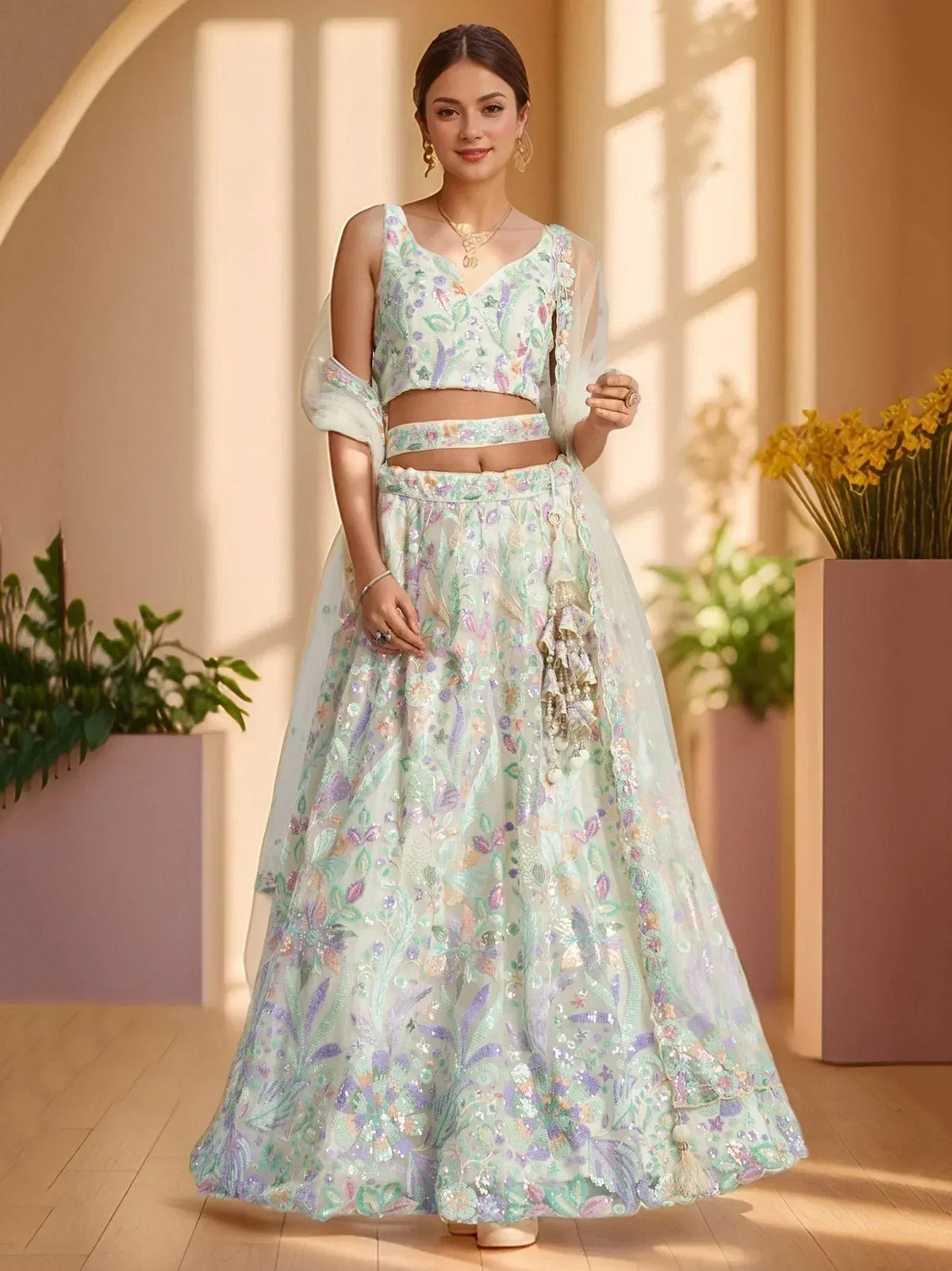 Elegant floral embroidered lehenga choli with pastel hues and sheer dupatta for Indian ethnic wear