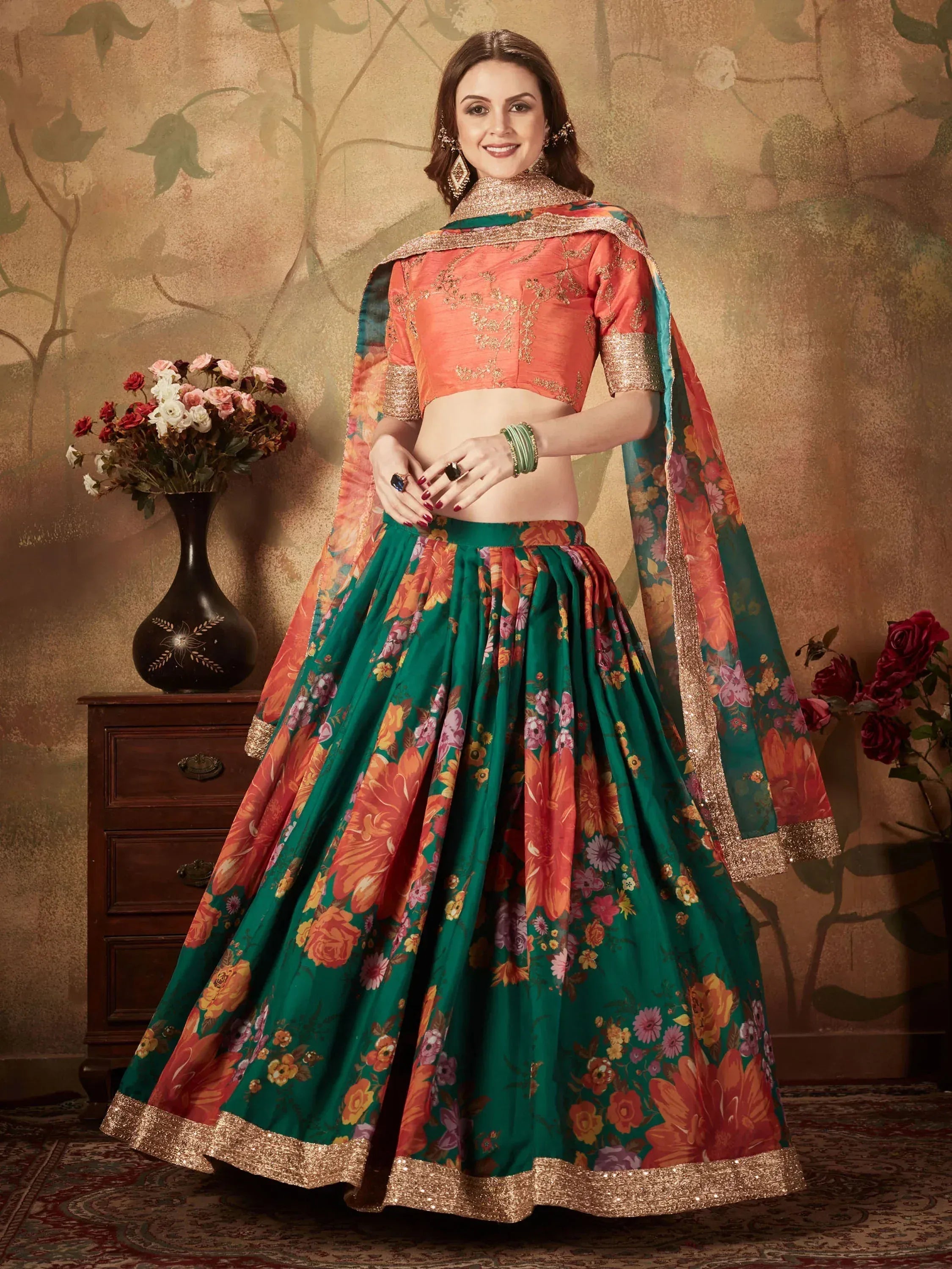 Floral print lehenga choli with gold trim, perfect for Indian ethnic wear and festive occasions