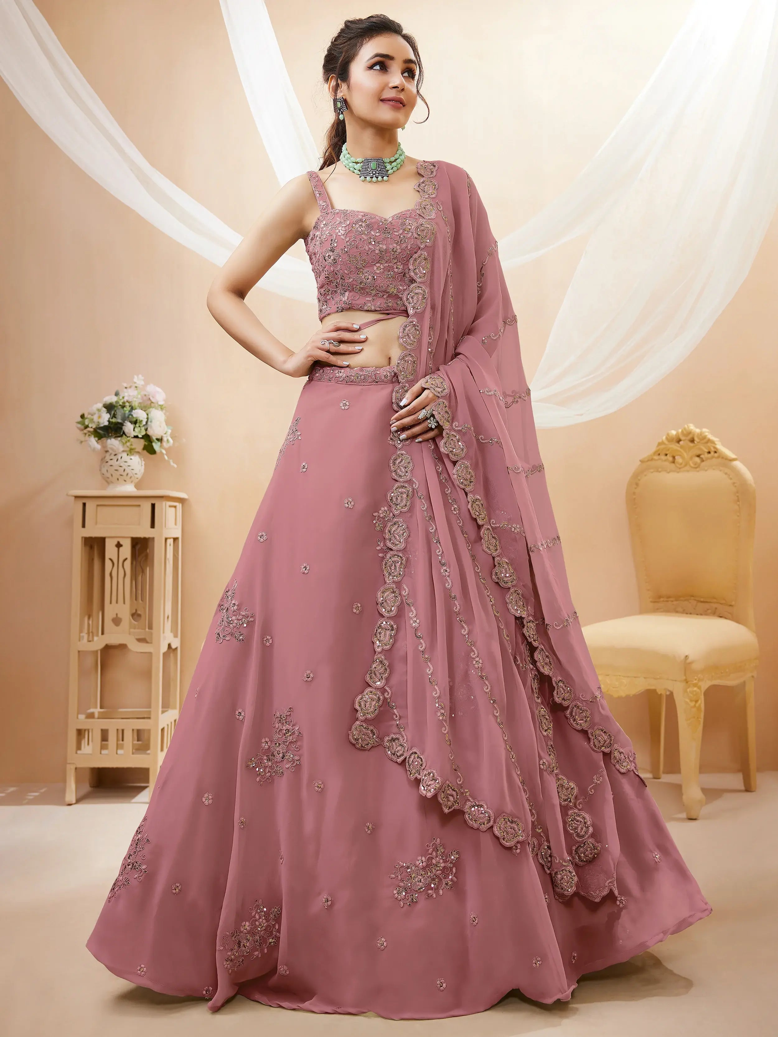 Attractive Dusty Pink Sequins Georgette Party Wear Lehenga Choli