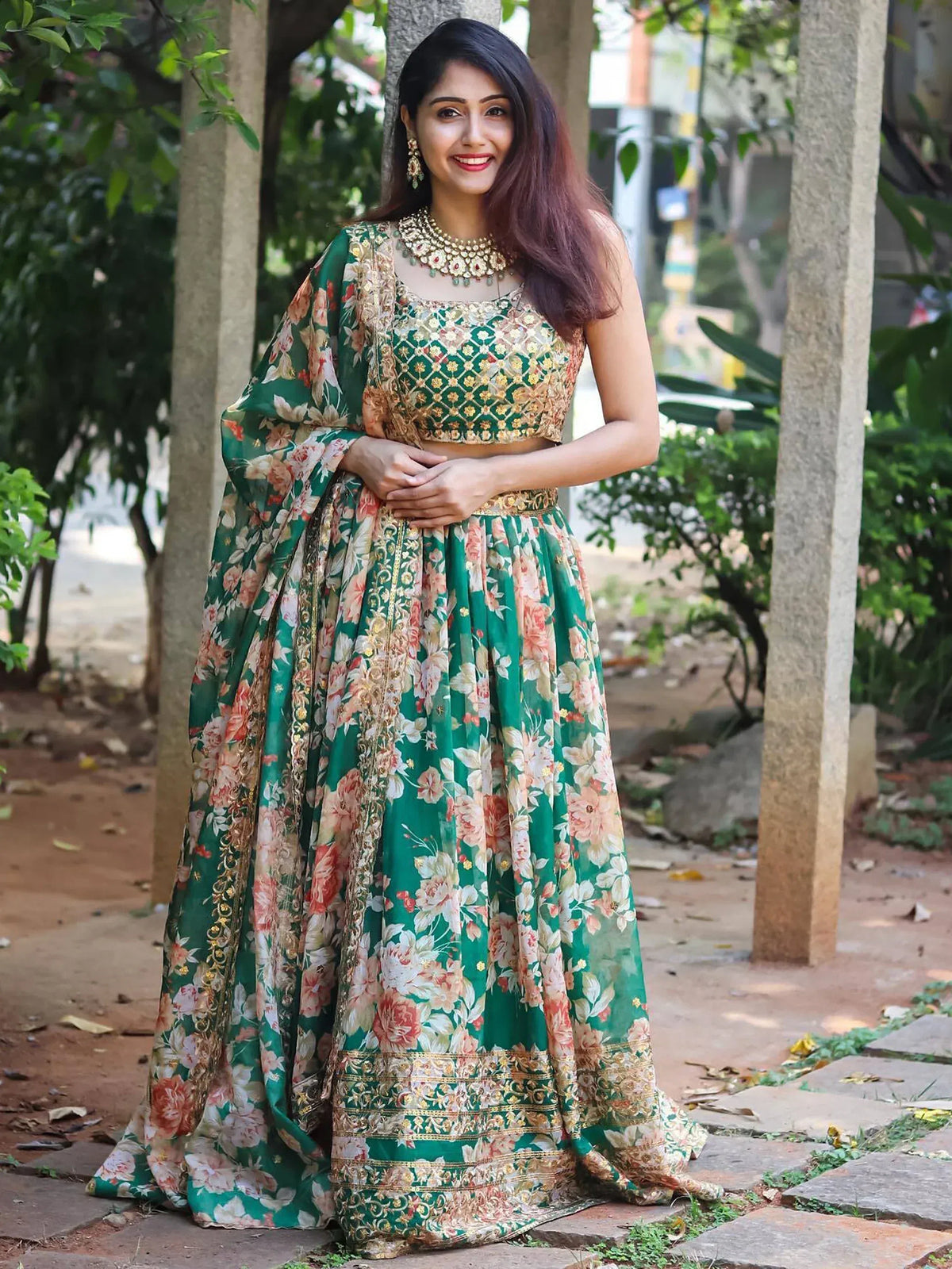 Green floral lehenga choli with gold embroidery, perfect for Indian ethnic wear occasions