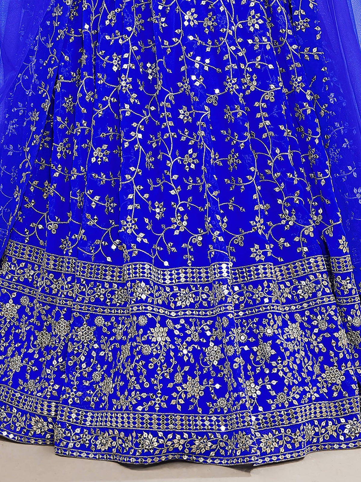 Royal blue lehenga with intricate silver floral embroidery and sequin detailing for ethnic wear