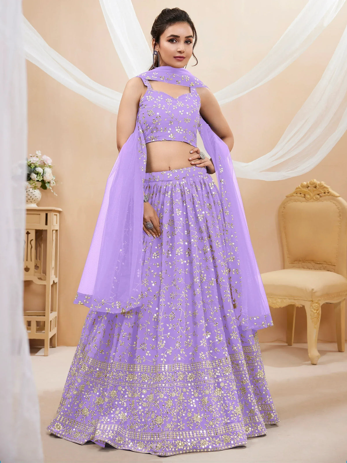 Lavender designer lehenga choli with gold floral embroidery, perfect for weddings and festive occasions.
