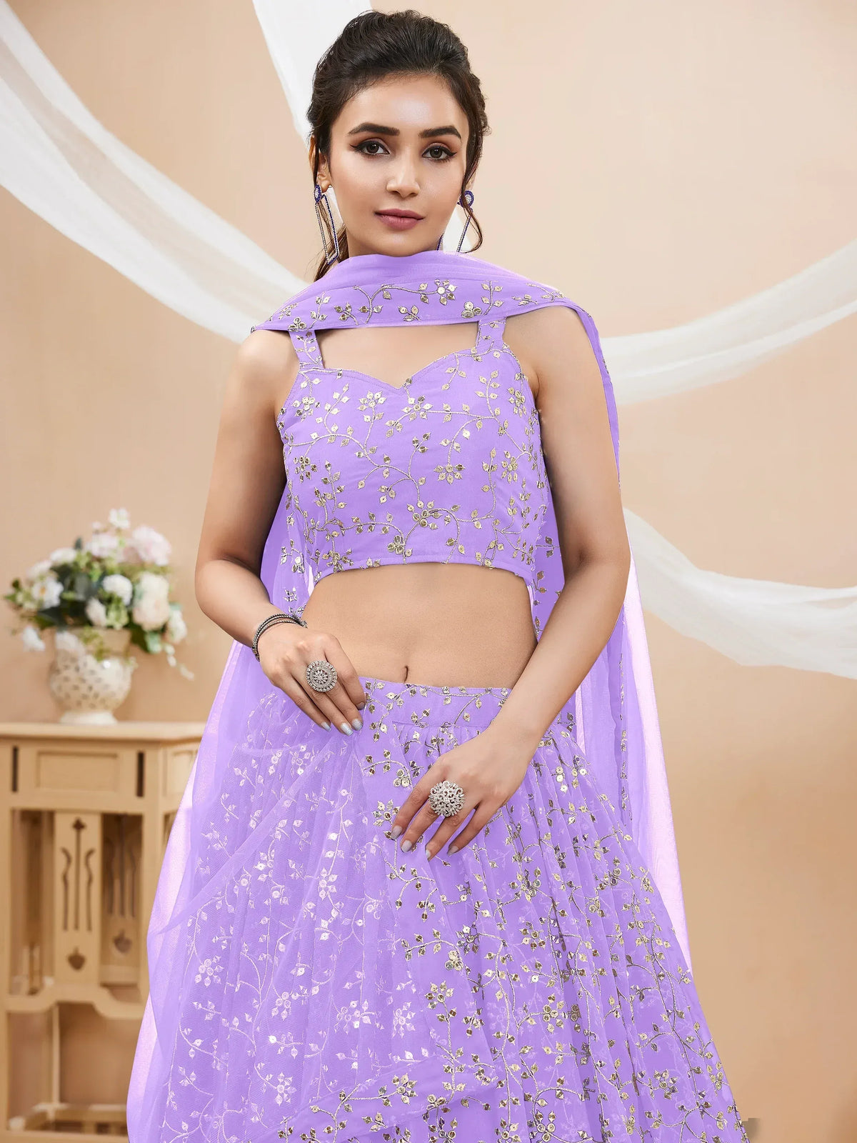 Purple embroidered lehenga choli with floral designs and matching dupatta for ethnic wear