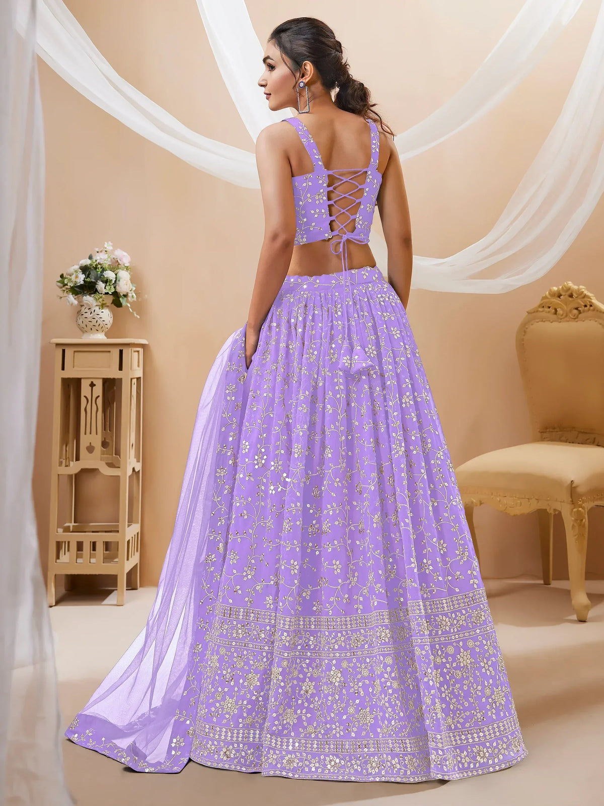 Lavender embroidered lehenga choli with lace-up back, perfect for Indian ethnic wear occasions