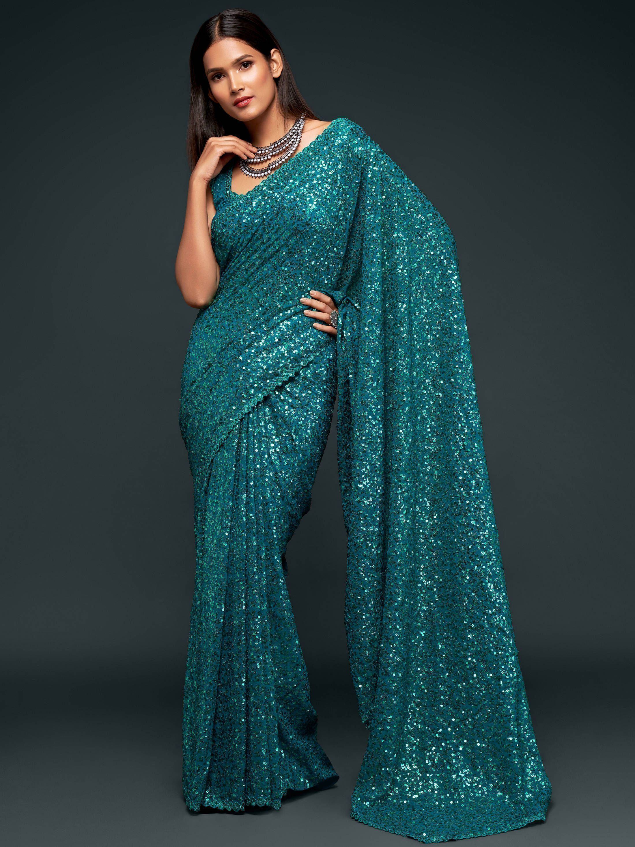 Sabyasachi Teal Blue Sequins Georgette Party Wear Saree With Blouse