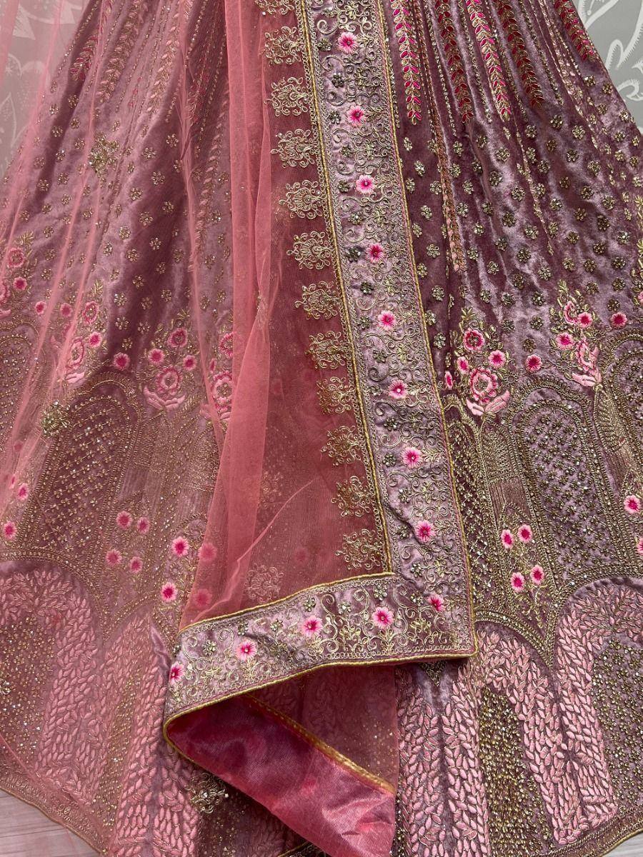 Pink velvet lehenga with gold embroidery and floral motifs, perfect for Indian ethnic wear