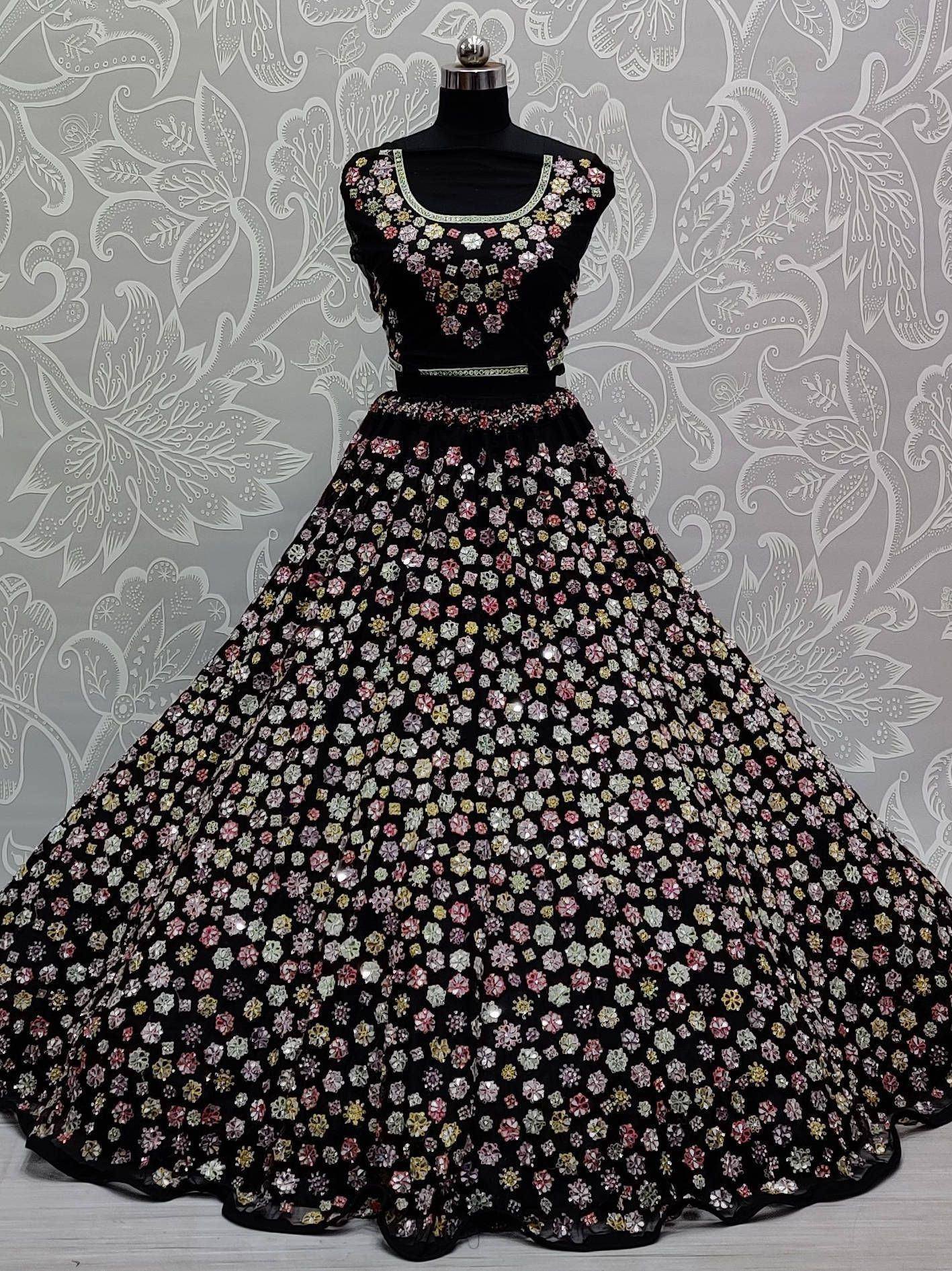 Black floral embroidered lehenga choli with colorful sequin work, perfect for Indian ethnic occasions