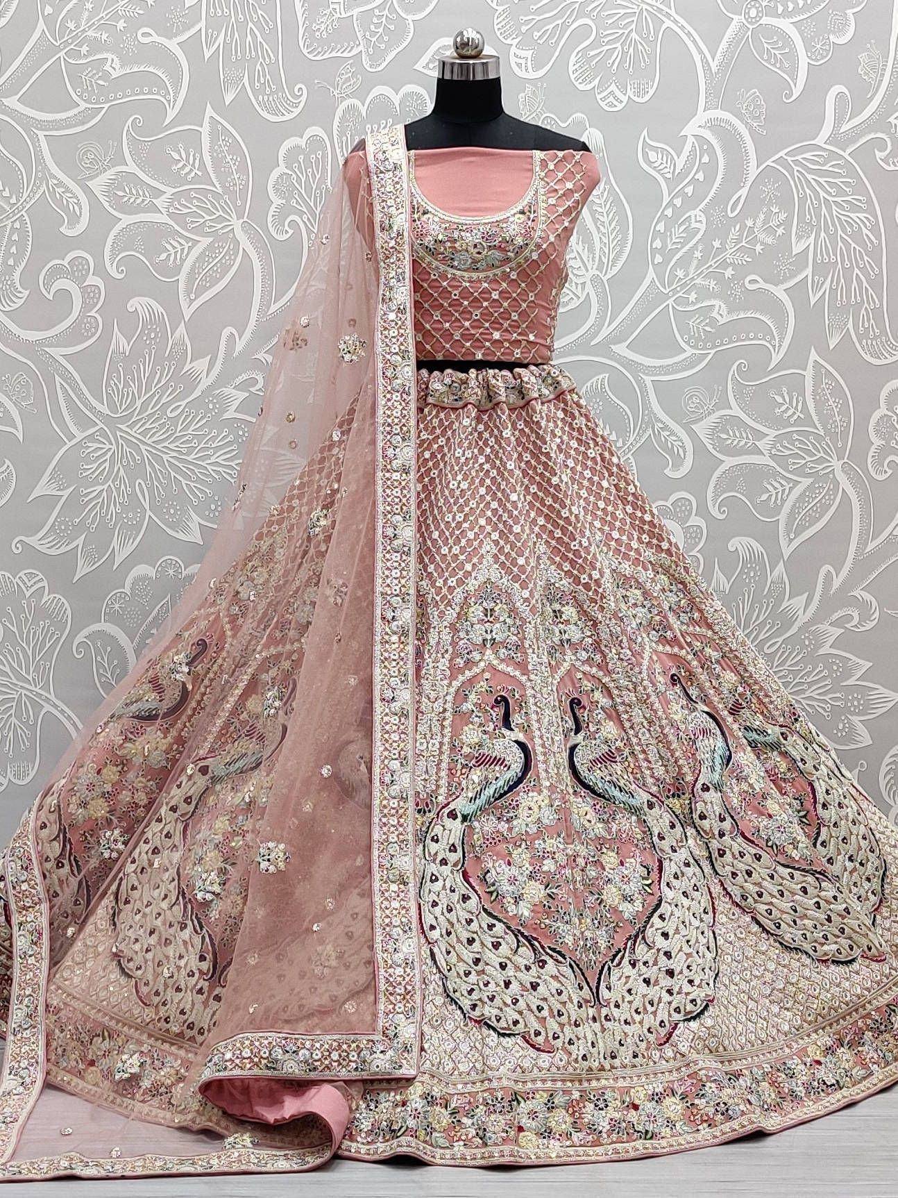 Pink designer lehenga choli with peacock embroidery and net dupatta, ethnic Indian wear