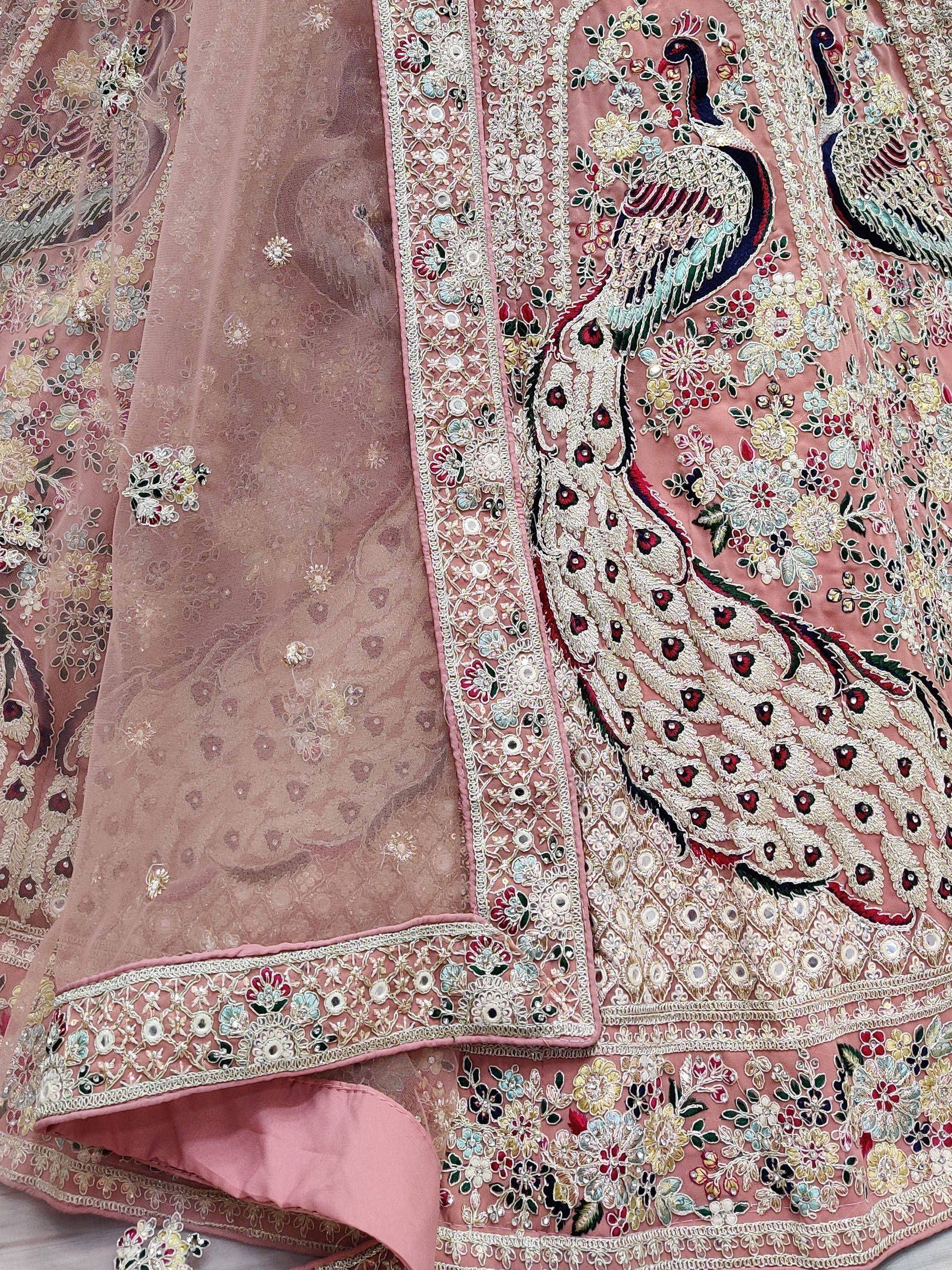Pink designer lehenga with peacock embroidery and floral motifs, perfect for Indian ethnic wear