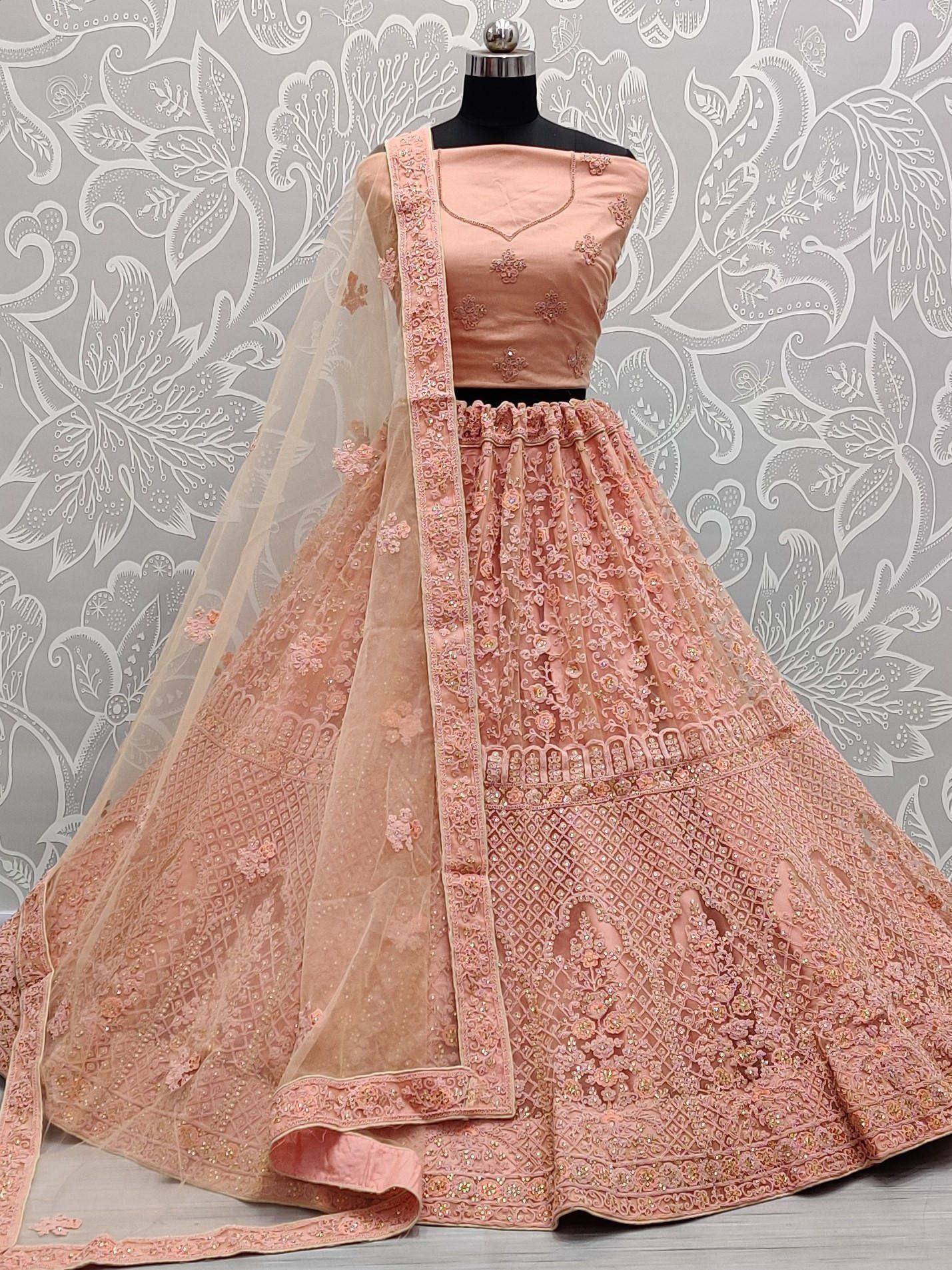 Pink embroidered lehenga choli with floral net dupatta, Indian ethnic wear for weddings and parties