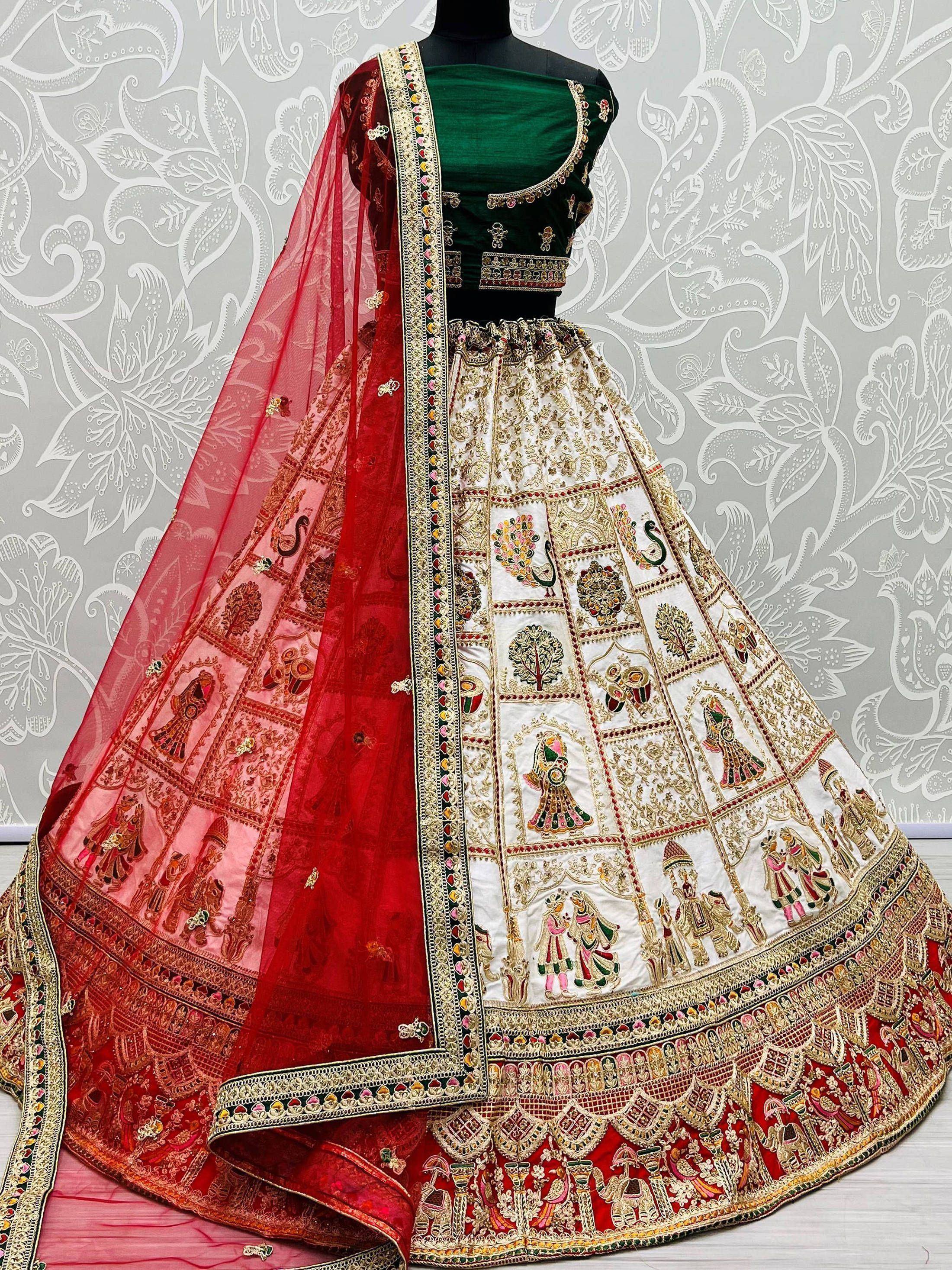 Designer lehenga choli with intricate embroidery, red dupatta, and green blouse for Indian ethnic wear
