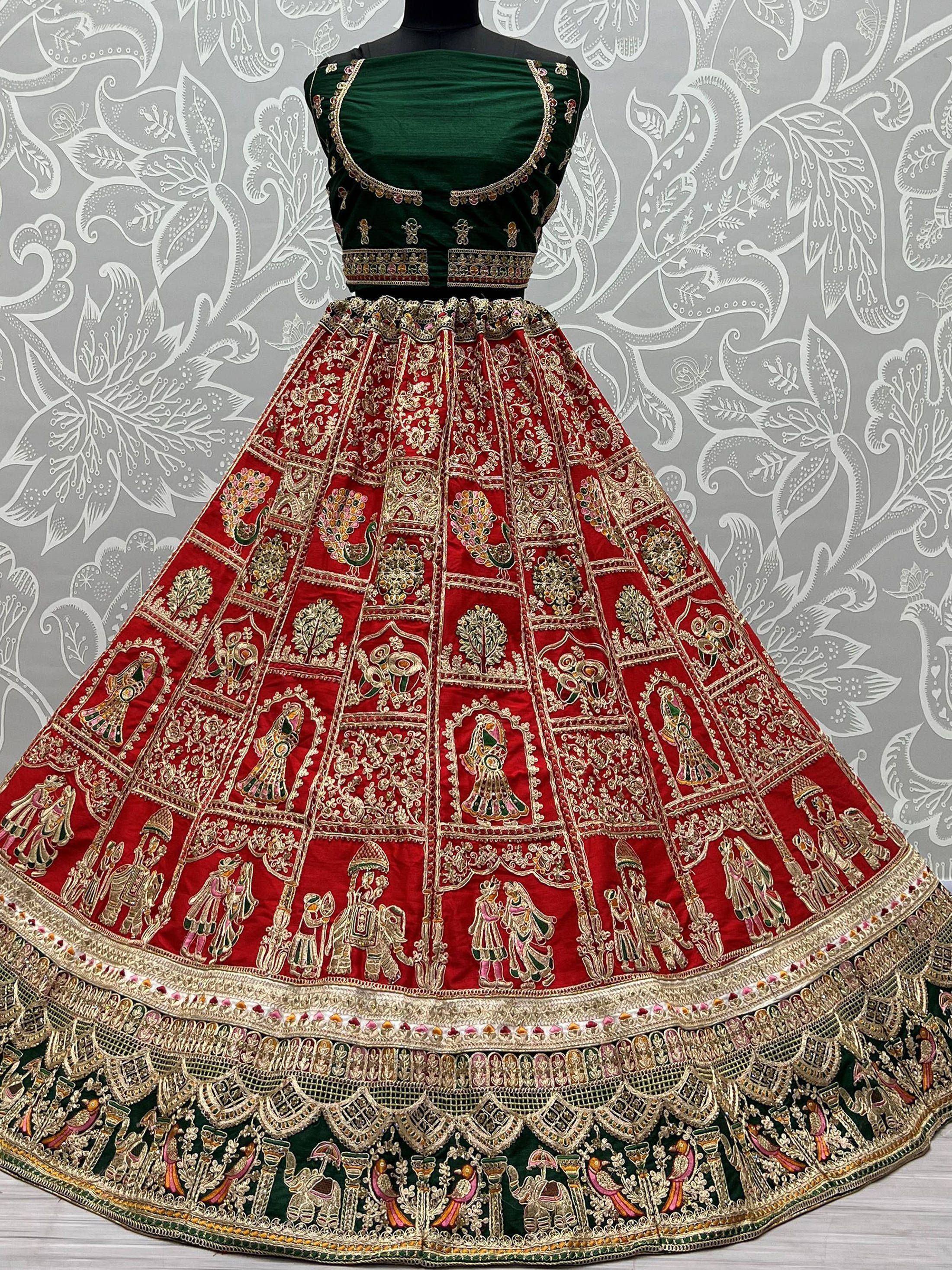 Red and green designer lehenga choli with intricate gold embroidery and traditional motifs, perfect for Indian ethnic wear.