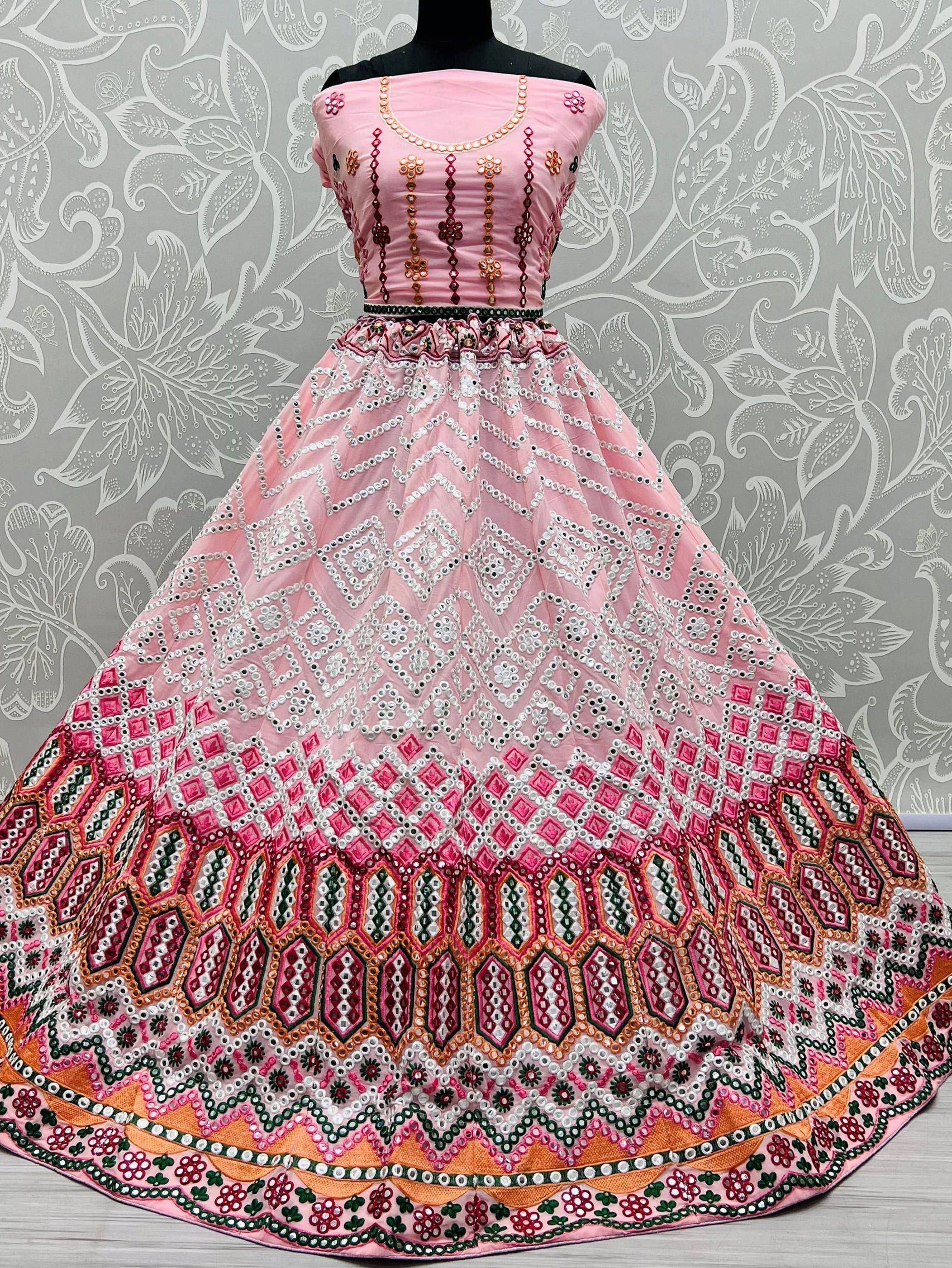 Pink embroidered lehenga choli with mirror work, perfect for Indian ethnic wear and festive occasions