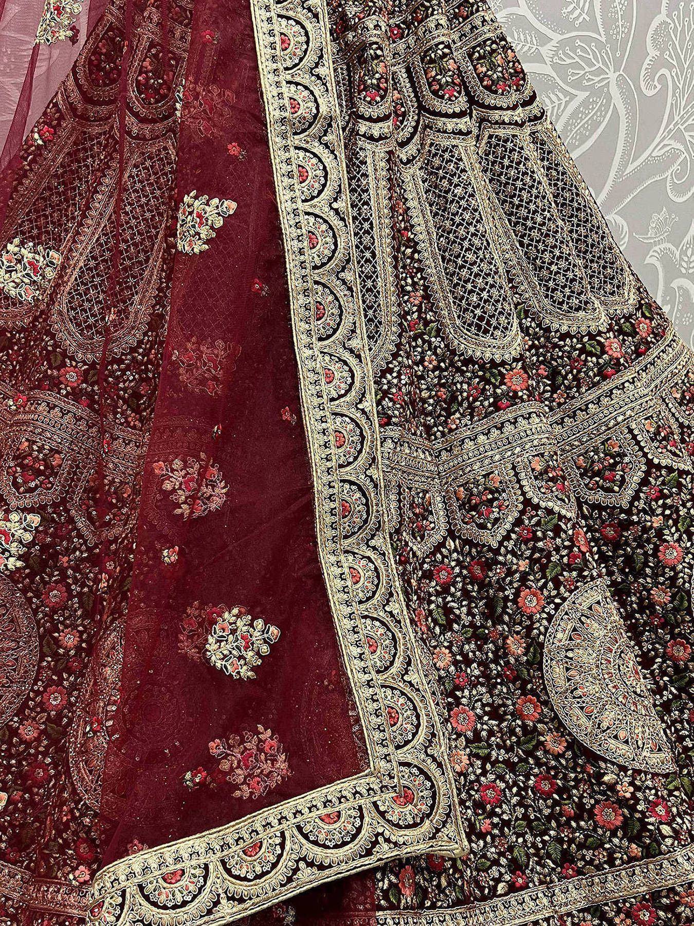 Maroon velvet lehenga with intricate floral embroidery and gold border, Indian ethnic wear
