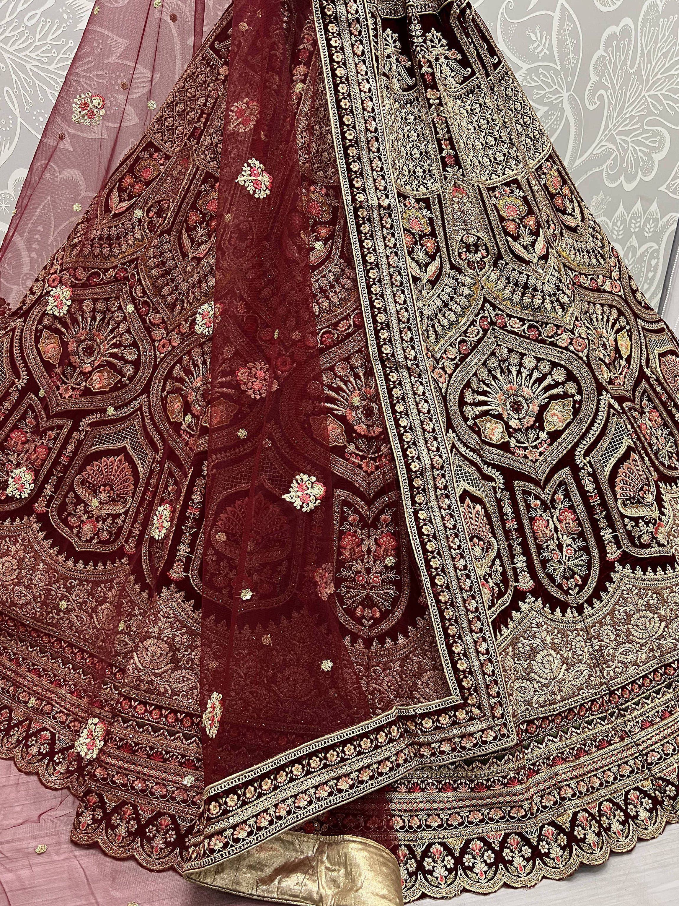 Maroon embroidered lehenga choli with gold floral work and sheer dupatta, Indian ethnic wear