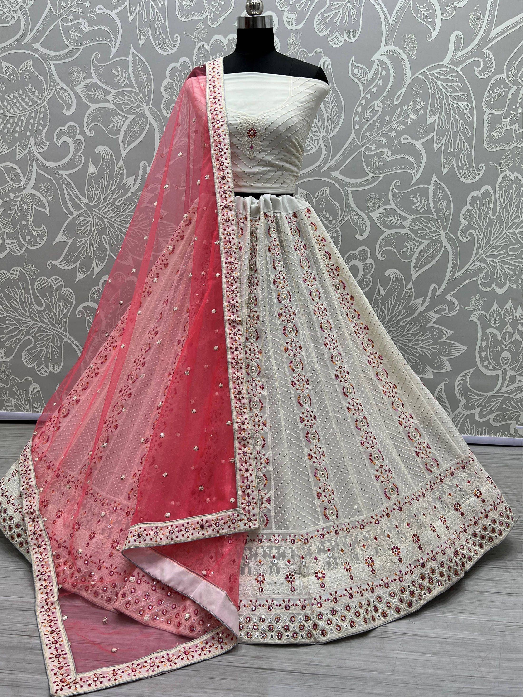 White embroidered lehenga choli with pink dupatta, designer Indian ethnic wear for weddings and parties