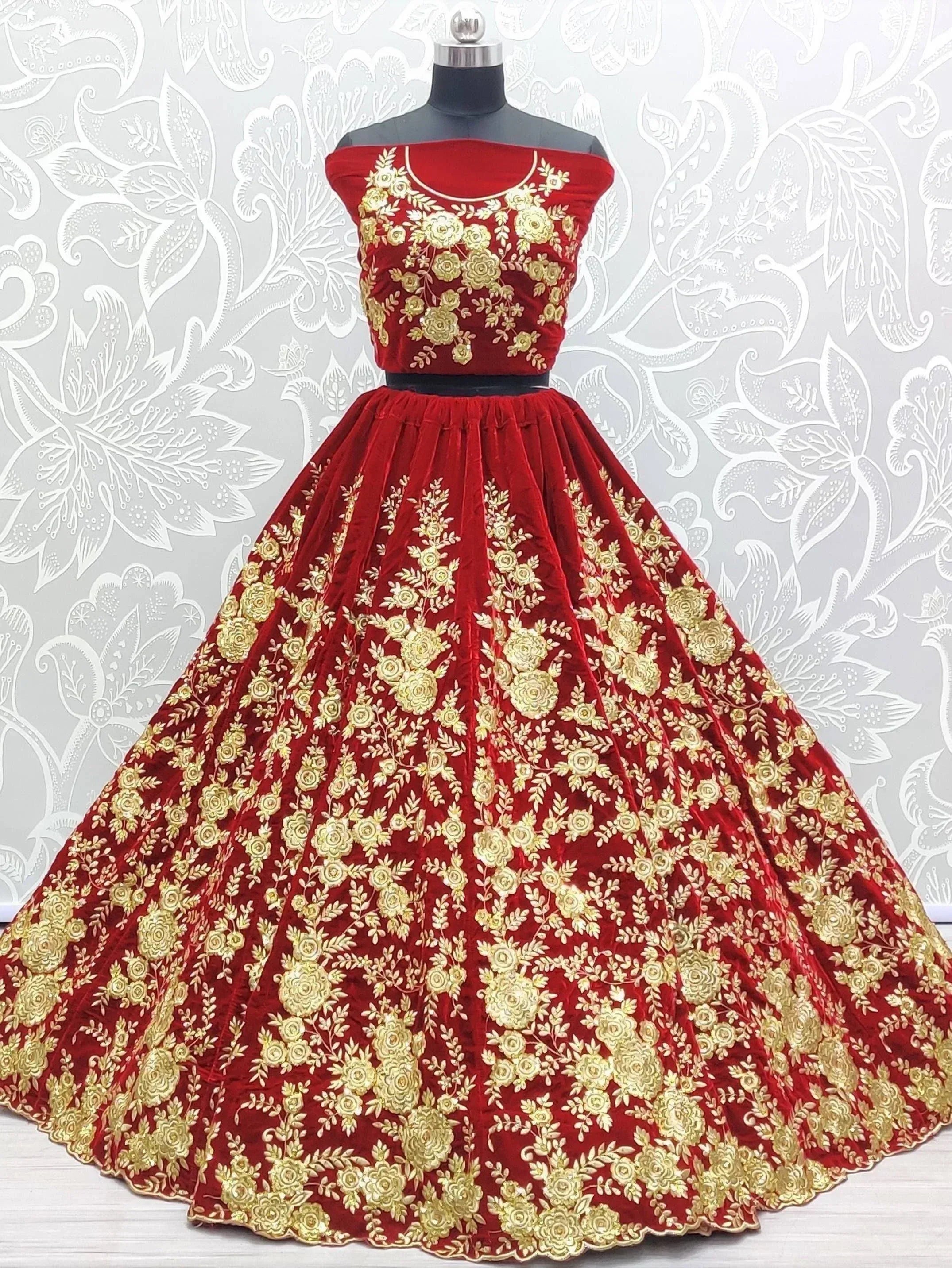 Red velvet lehenga choli with gold floral embroidery, off-shoulder top, ethnic Indian wear