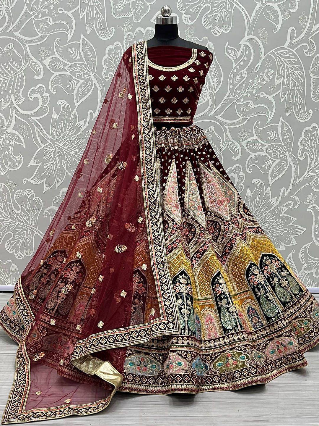 Maroon velvet designer lehenga choli with heavy embroidery and dupatta, ethnic Indian wedding wear