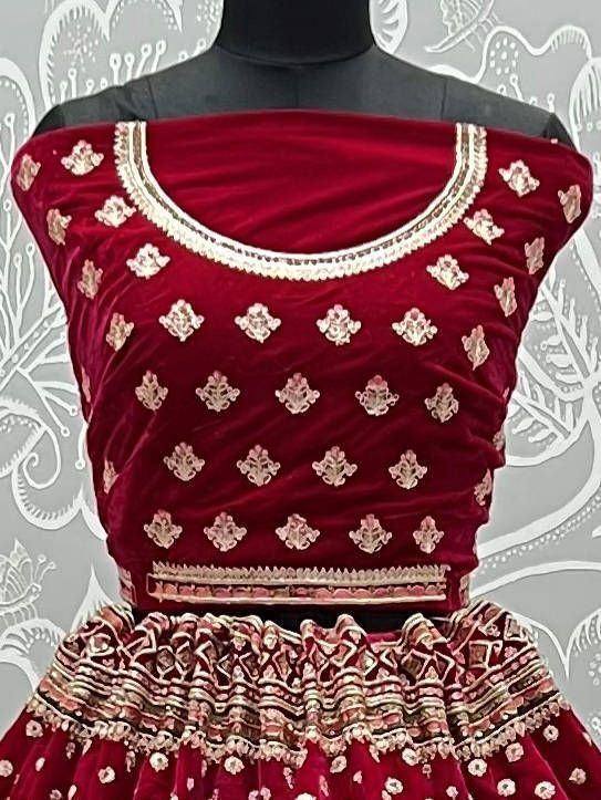 Maroon velvet lehenga choli with gold embroidery, perfect for Indian ethnic wear occasions