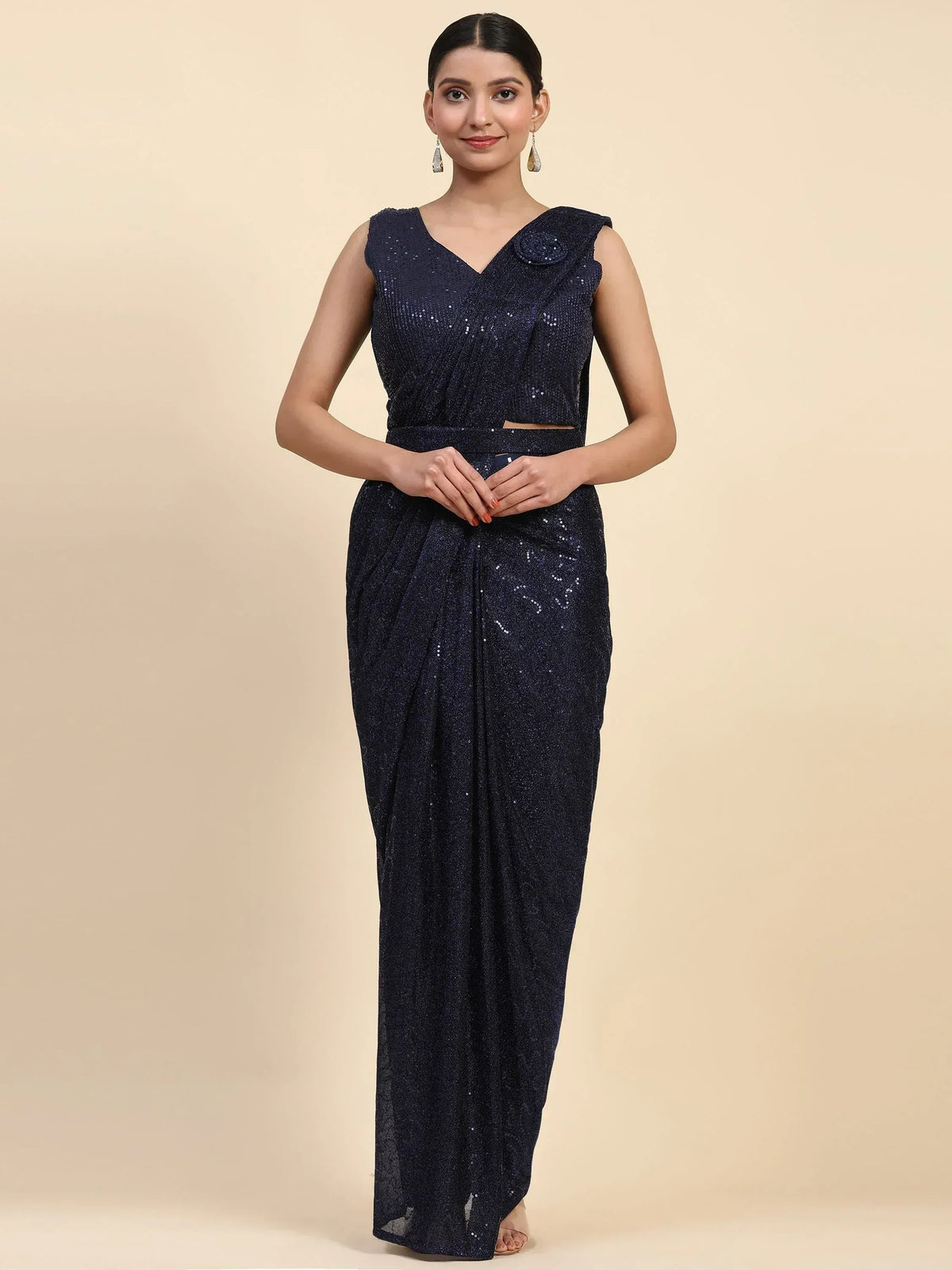 Navy blue sequin saree with sleeveless blouse, perfect for Indian ethnic occasions and parties.