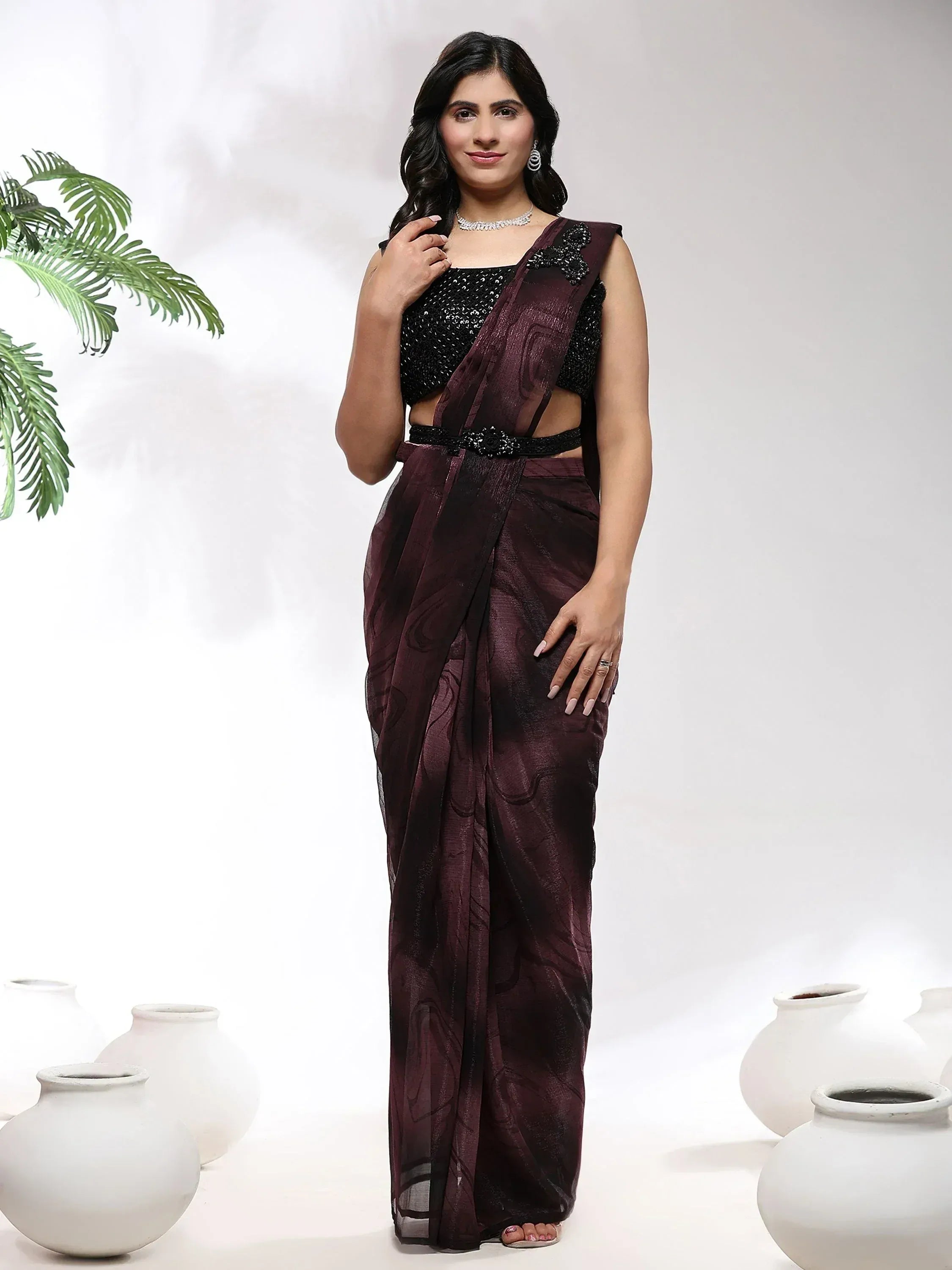Elegant maroon saree with black sequin blouse, perfect for Indian ethnic wear occasions