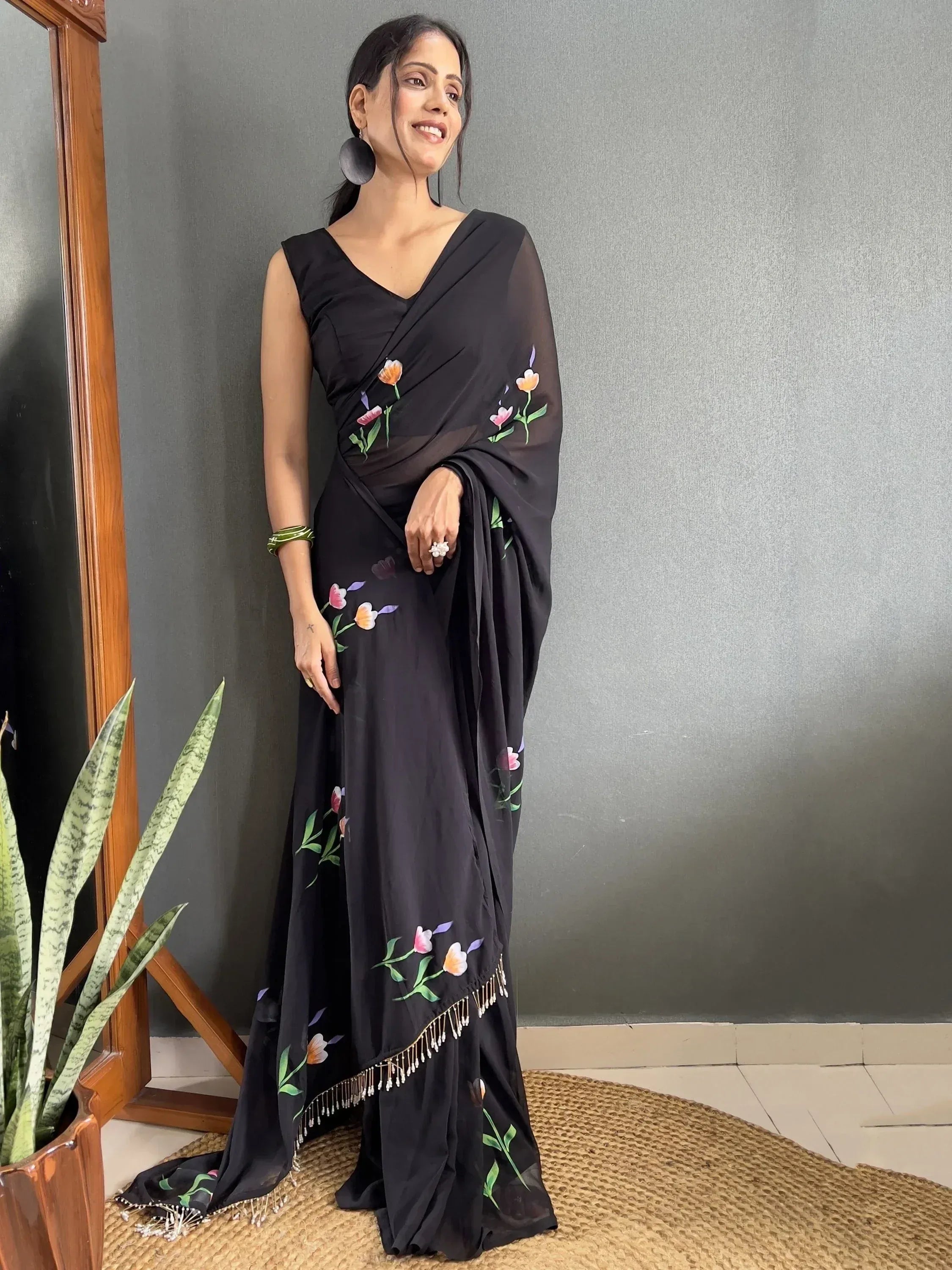 Black floral print saree with tassels, Indian ethnic wear for women