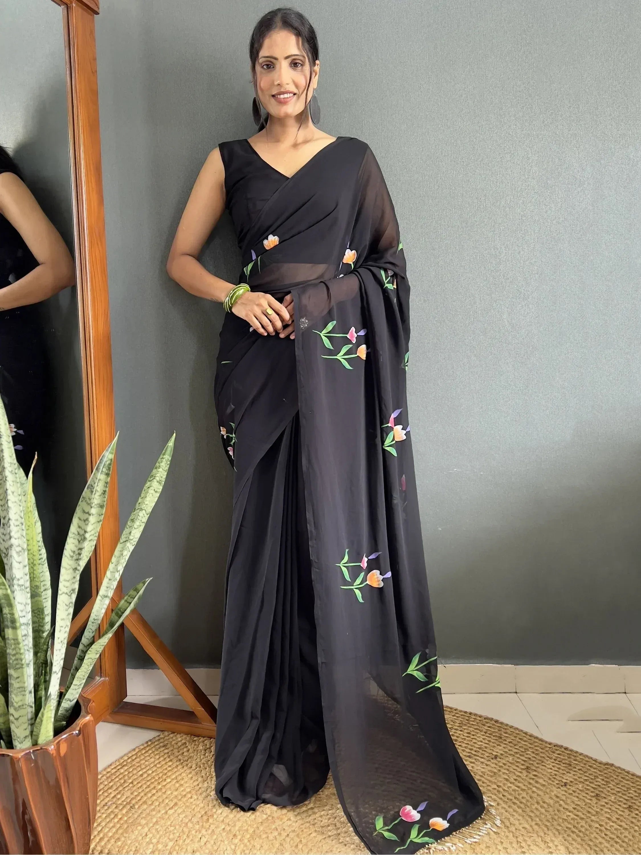 Black saree with floral embroidery, stylish Indian ethnic wear for women