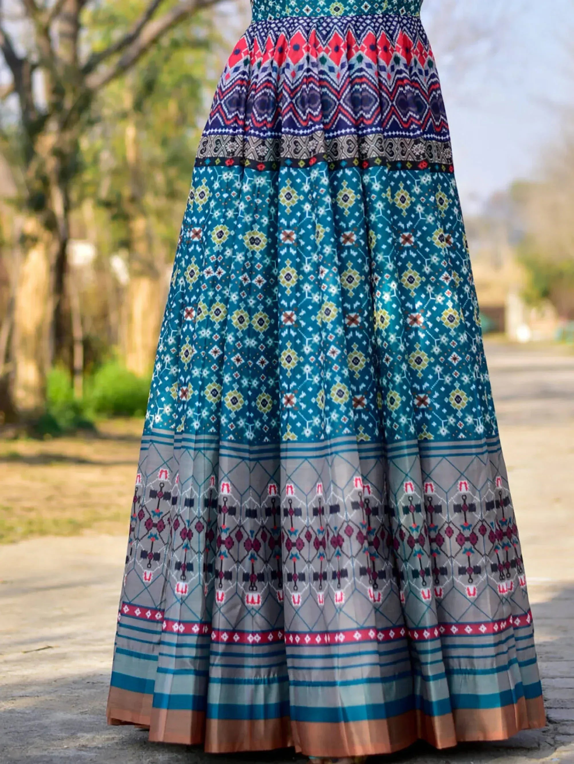 Colorful ethnic printed long skirt with geometric patterns, perfect for Indian festive wear