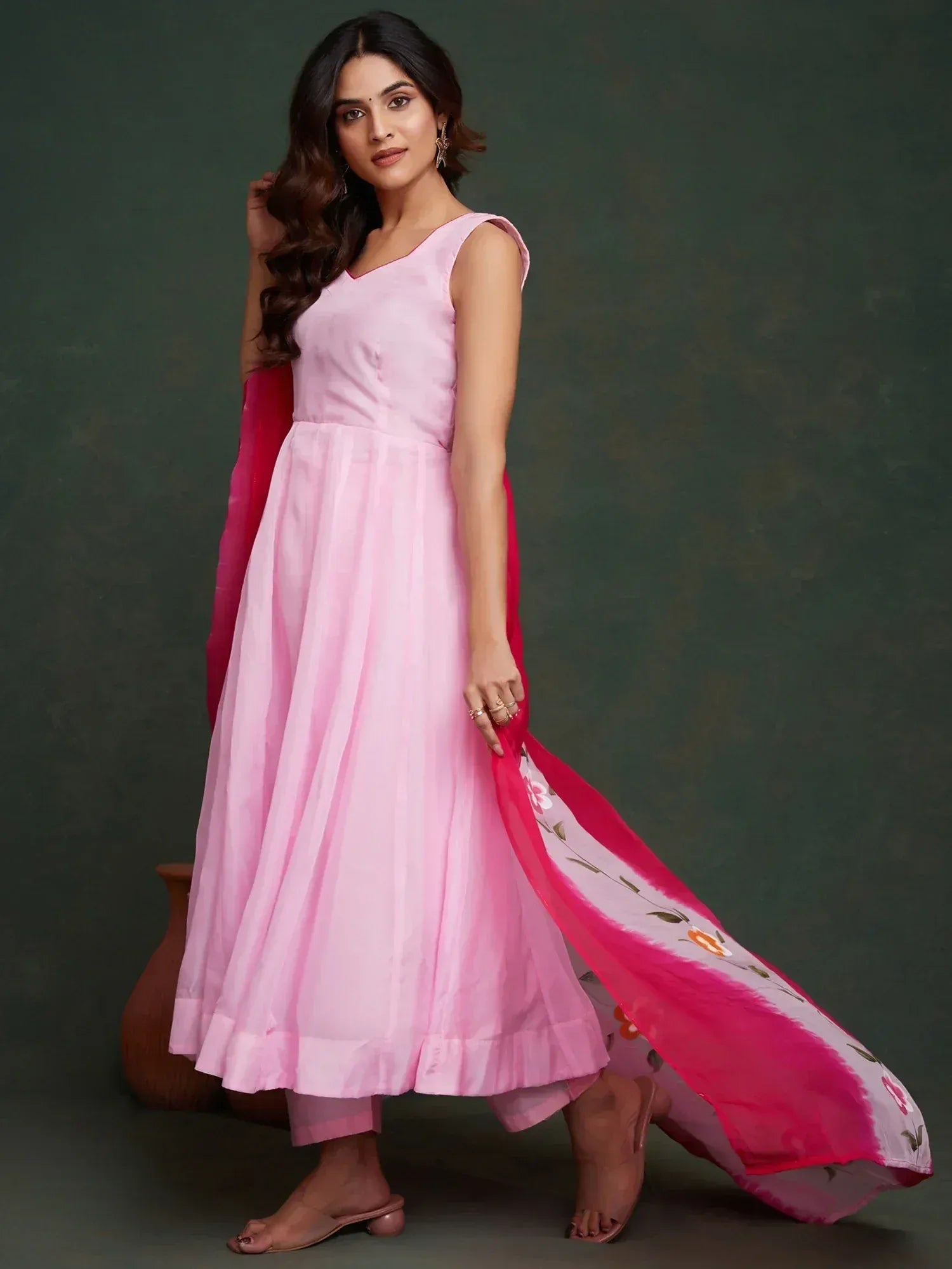 Pink sleeveless ethnic anarkali gown with floral dupatta, perfect for Indian occasions