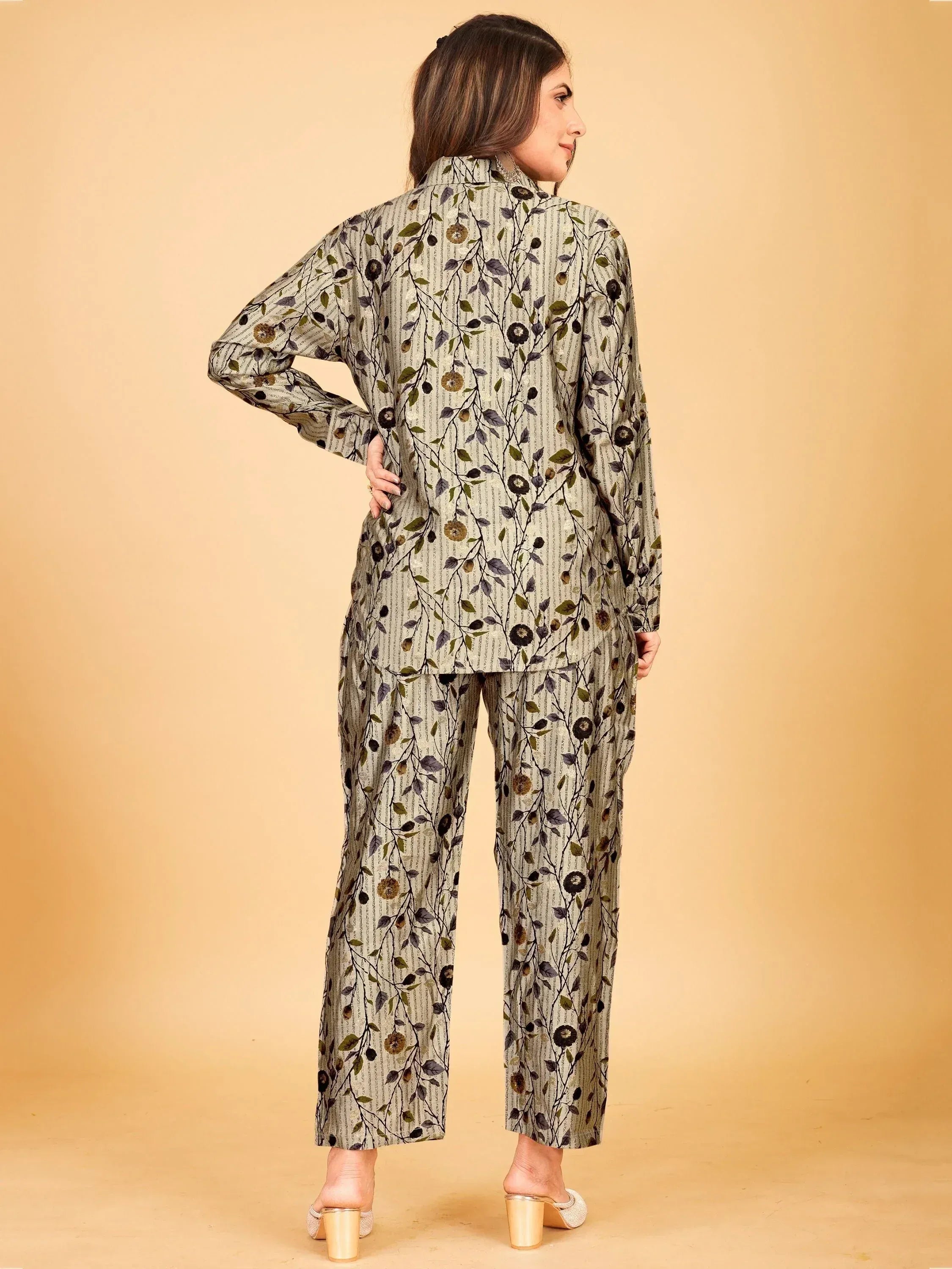 Floral print ethnic salwar kameez set with long sleeves and wide pants, perfect for casual wear