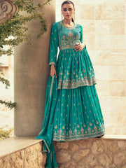 Woman wearing teal embroidered designer Anarkali gown, Indian ethnic wear from Ethnic Plus