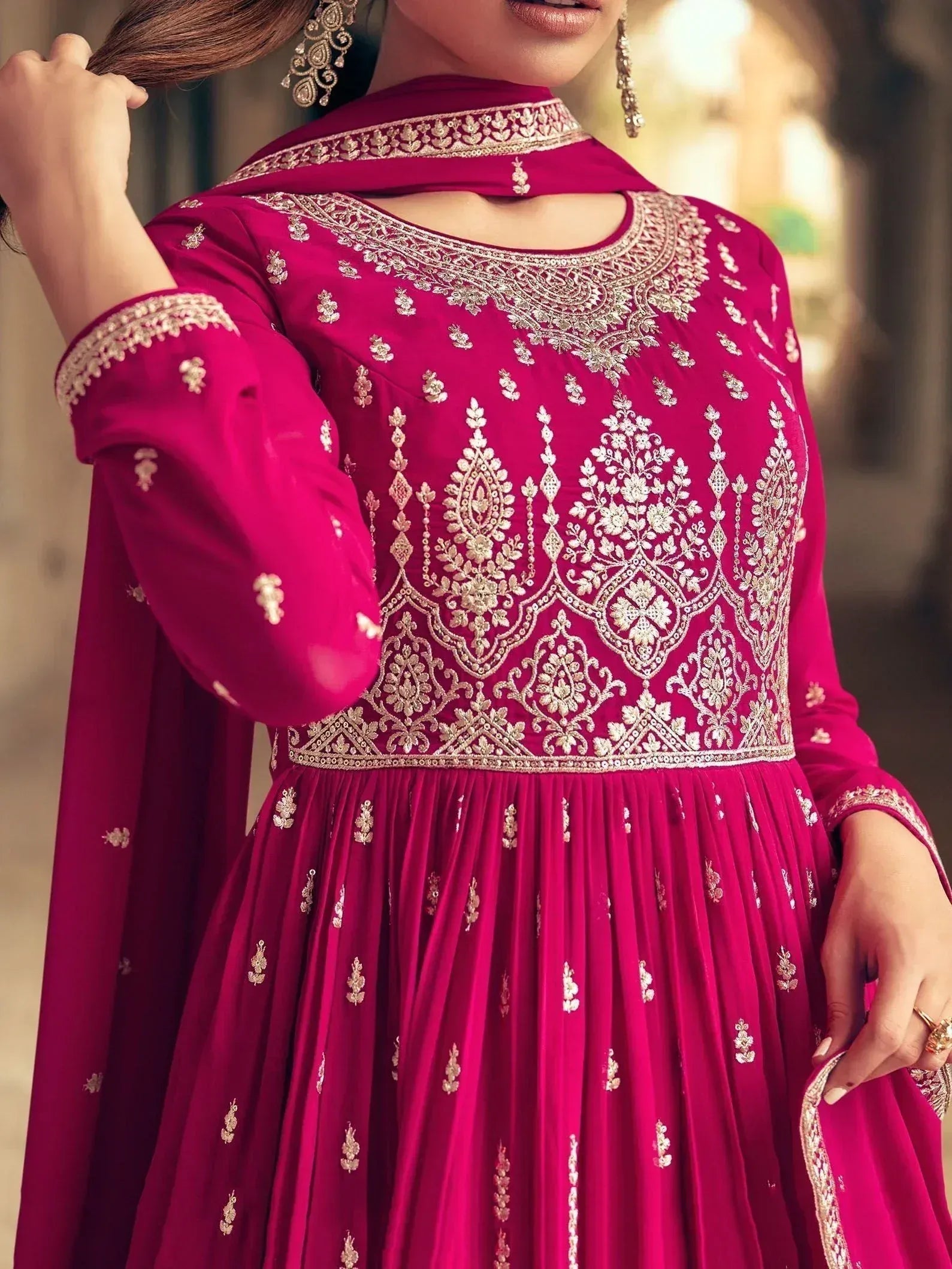 Elegant magenta anarkali with gold embroidery, perfect for Indian ethnic wear and festive occasions.
