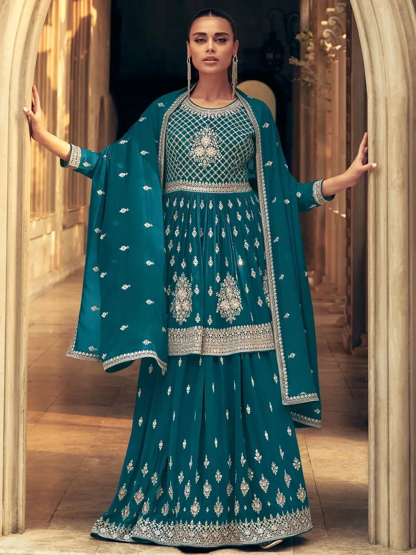 Teal embroidered Indian sharara suit with dupatta, perfect for weddings and festive occasions
