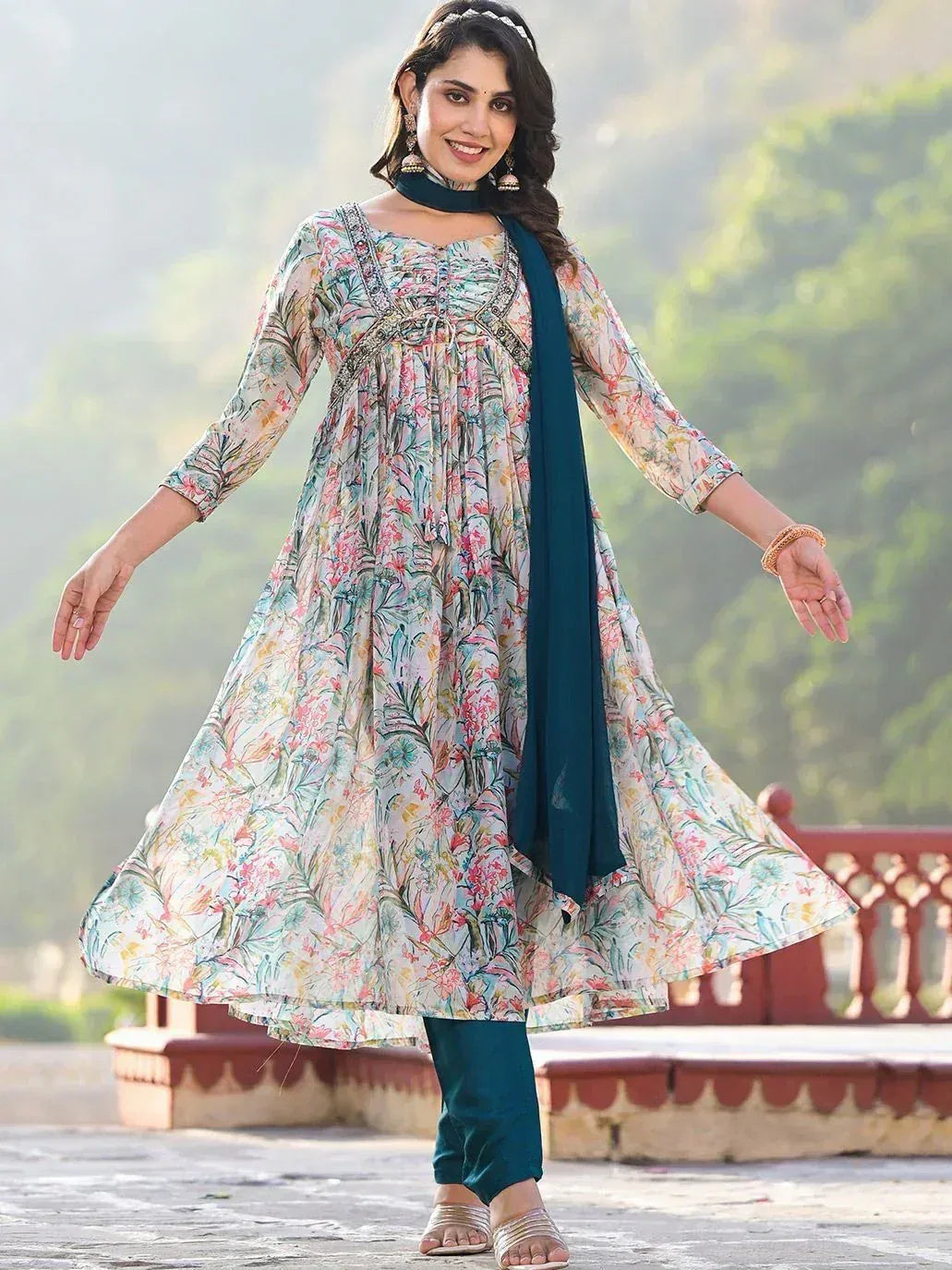 Floral printed ethnic kurta with teal pants and dupatta, perfect for Indian festive wear