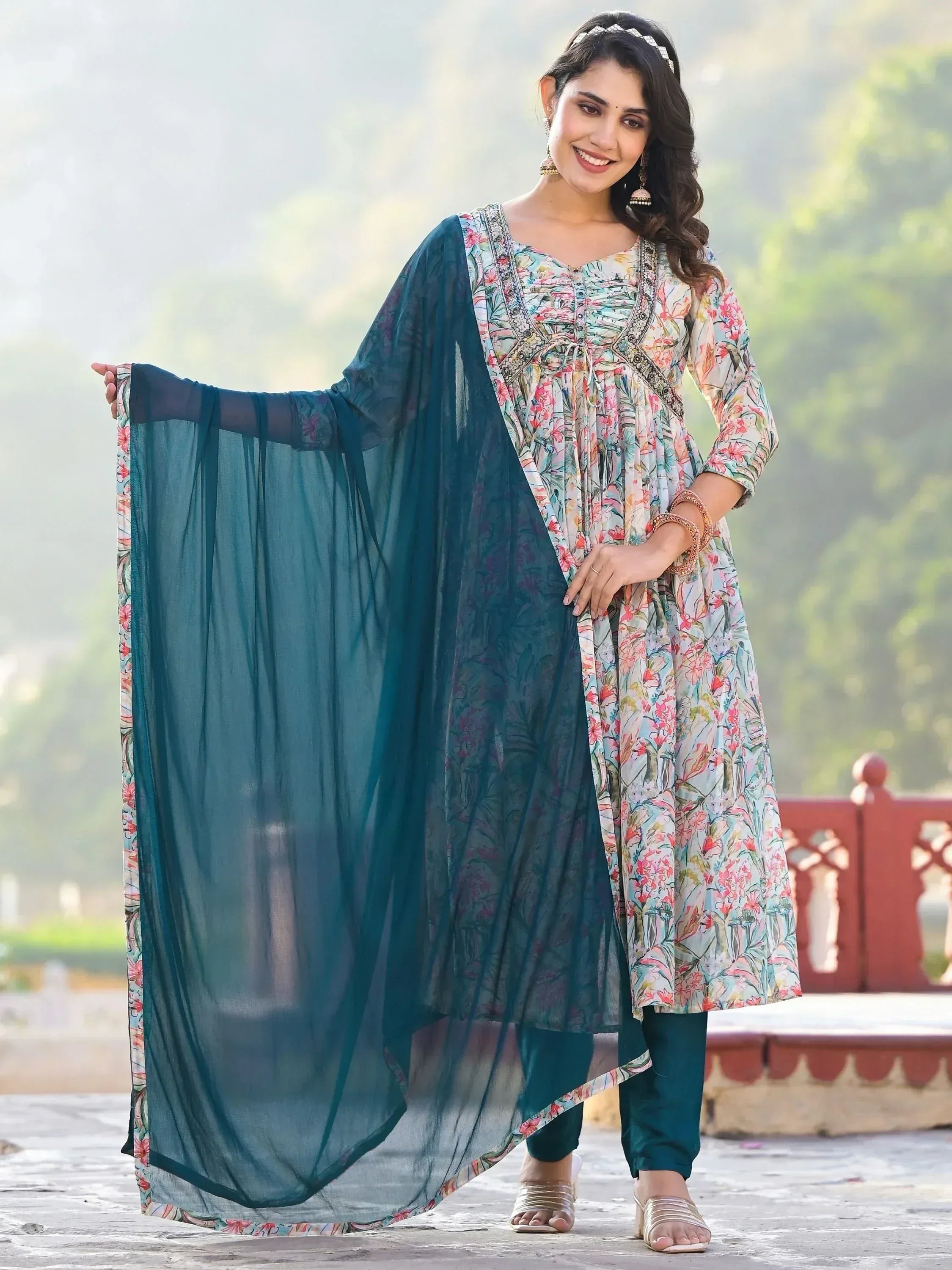 Floral printed ethnic kurti with teal dupatta and palazzo pants, perfect for Indian occasions