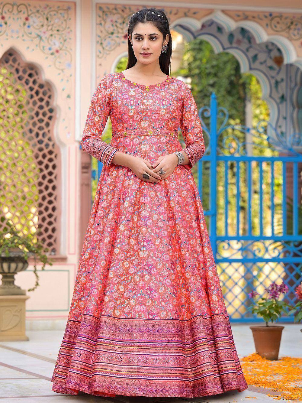 Pink floral printed ethnic gown with intricate border, perfect for Indian occasions and festive wear