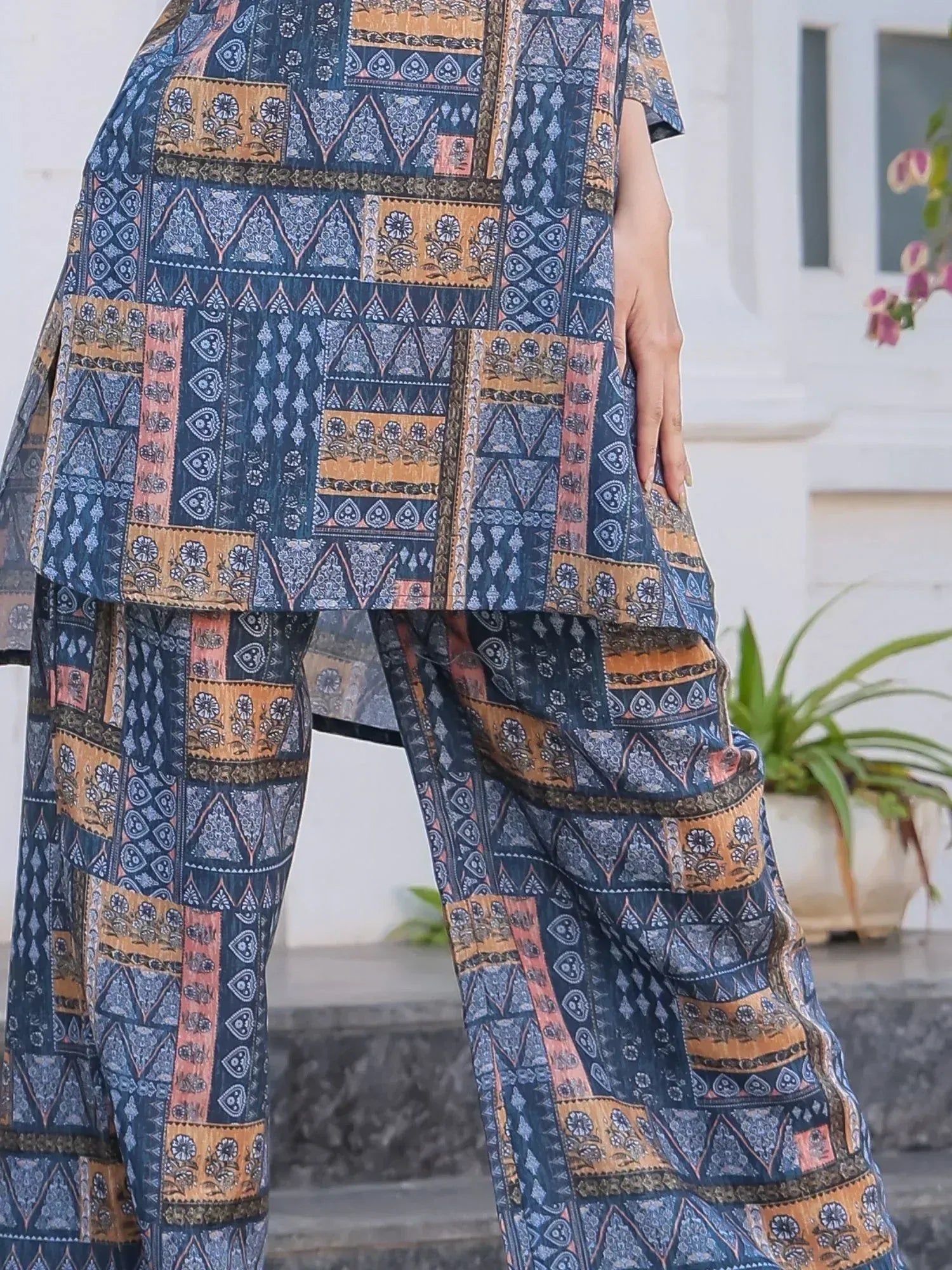 Blue and gold printed ethnic salwar kameez with patchwork design, perfect for Indian wear