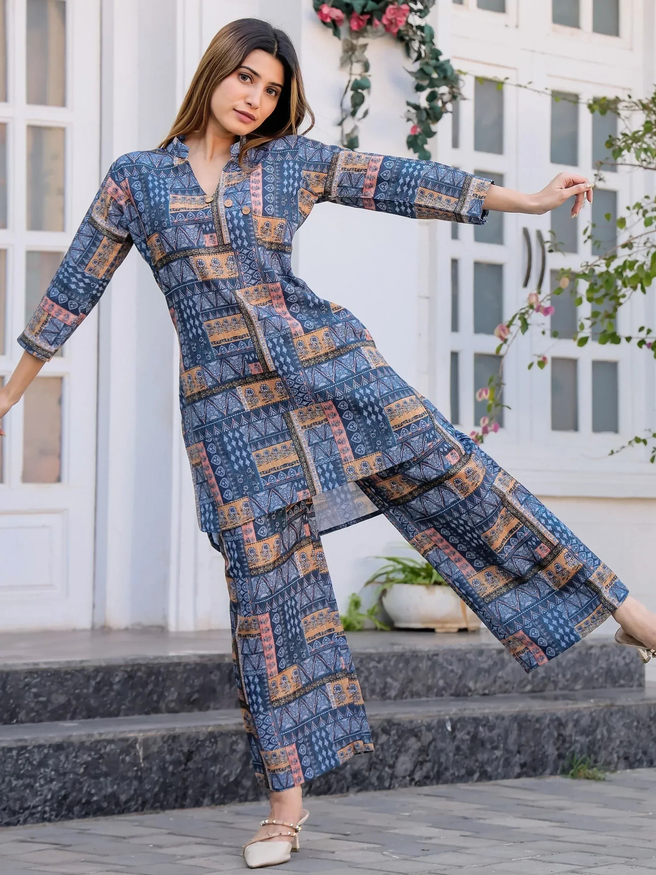 Blue printed ethnic salwar kameez with geometric patterns, perfect for Indian wear