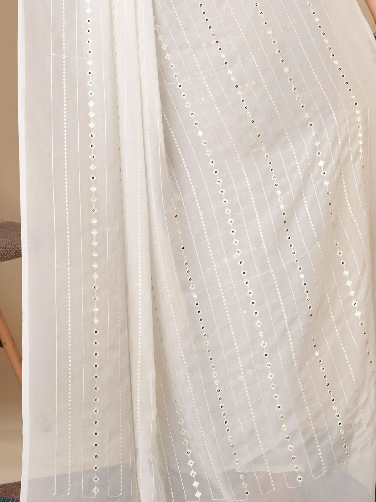 White ethnic saree with delicate mirror and thread embroidery, perfect for Indian festive wear