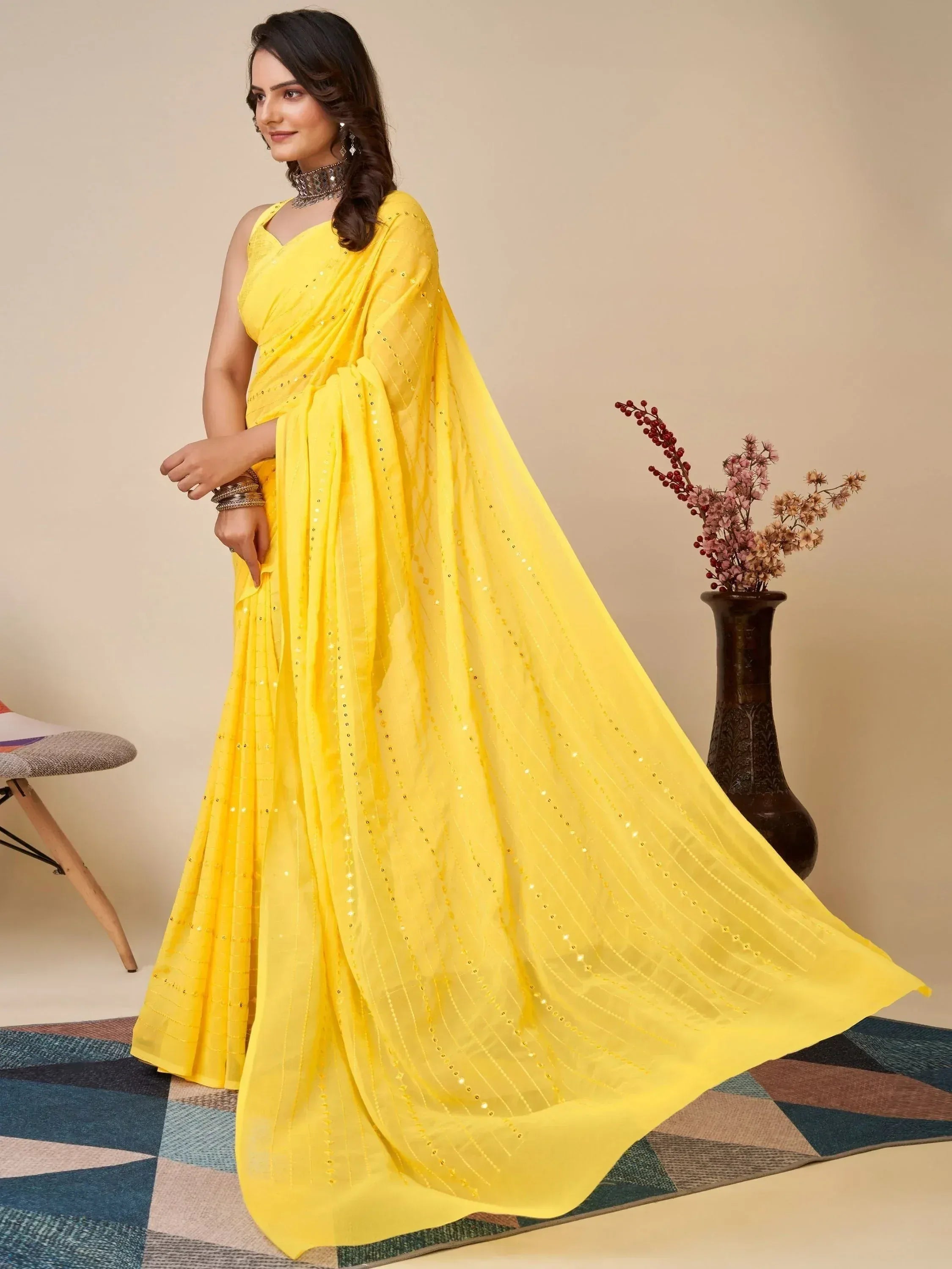 Vibrant yellow ethnic saree with sequin detailing, perfect for Indian festive occasions and weddings.