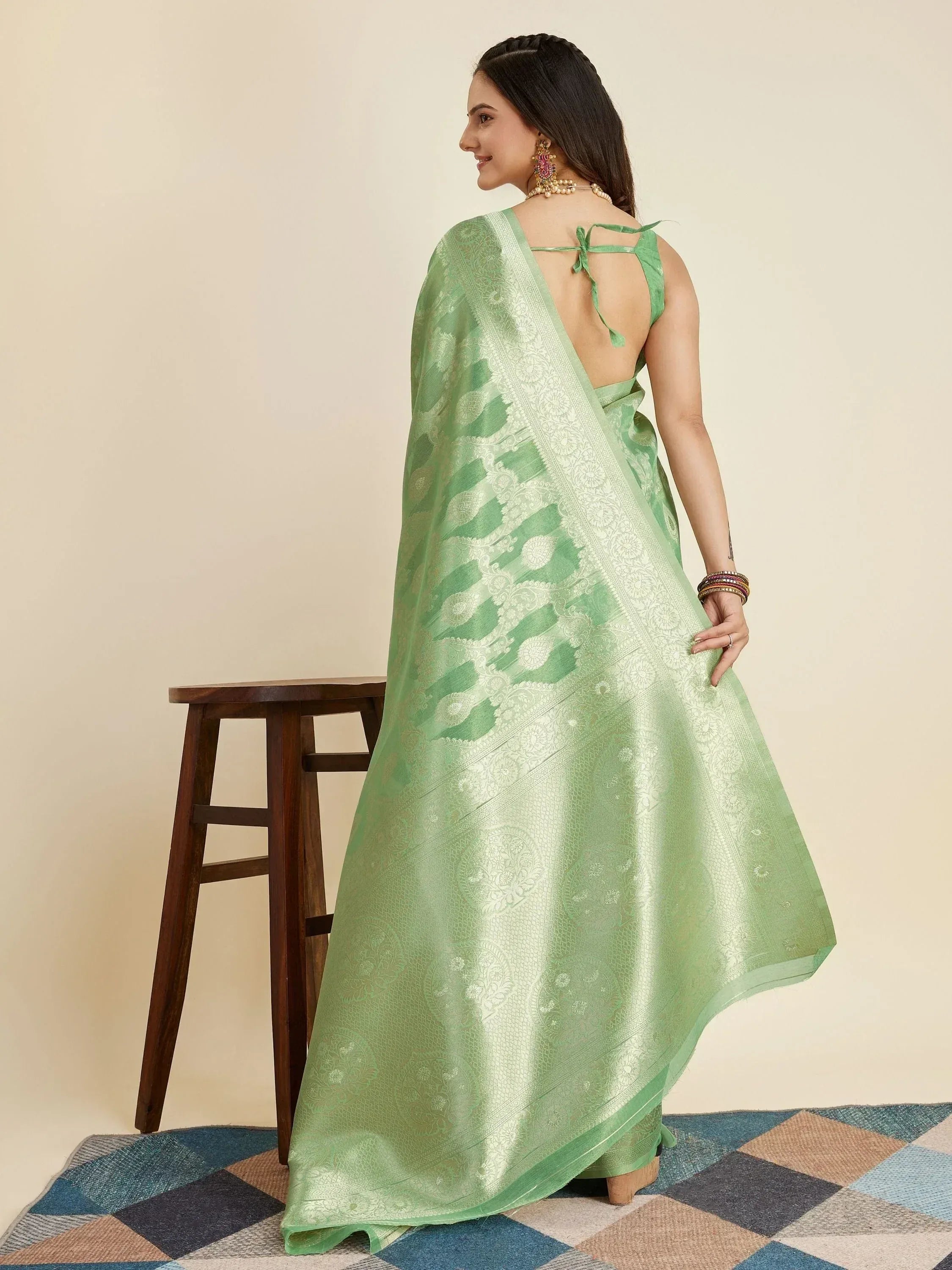 Green designer saree with intricate white embroidery and back tie blouse, ethnic Indian wear