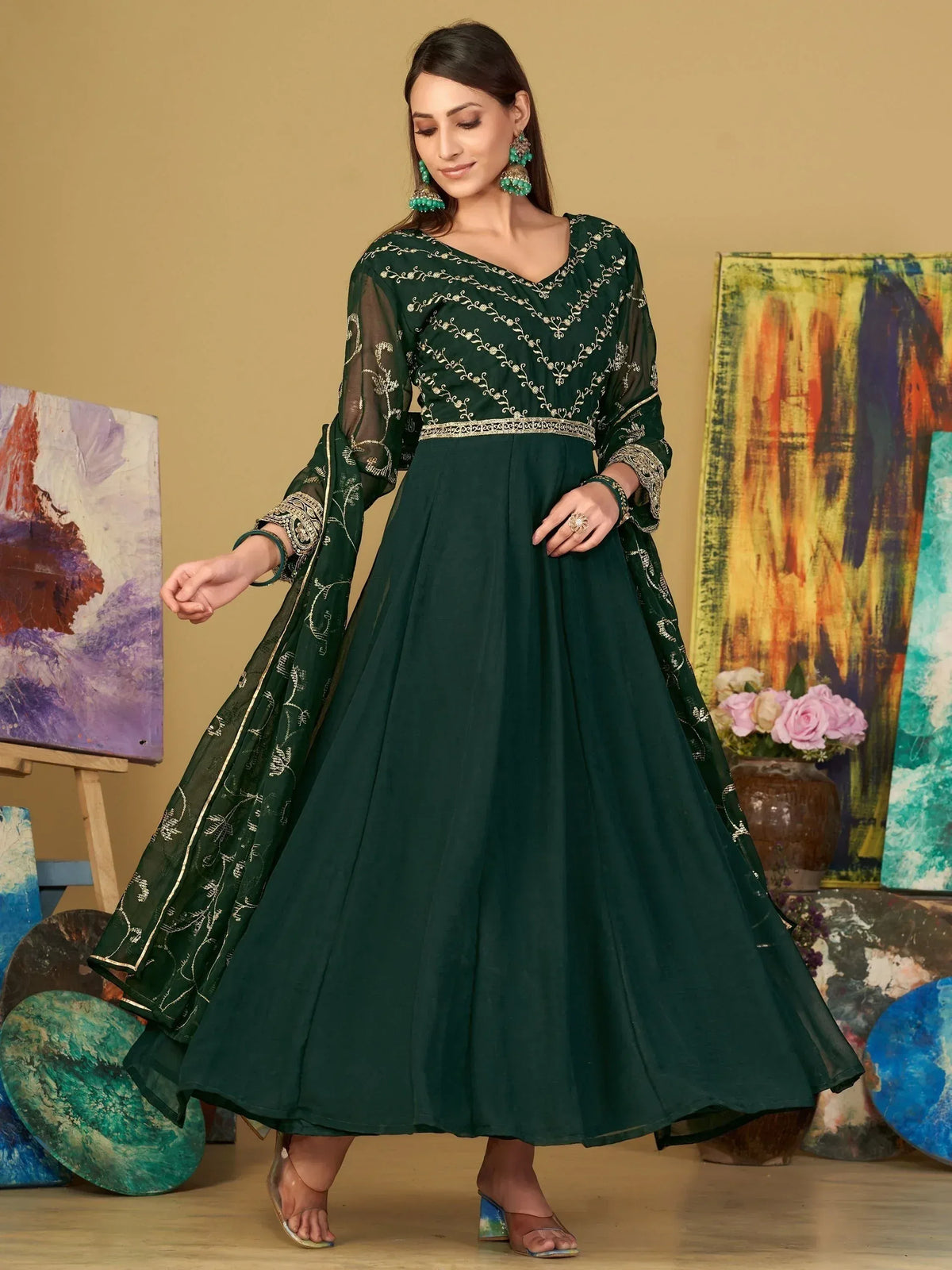 Emerald green embroidered anarkali gown with sheer sleeves, perfect for Indian ethnic wear occasions