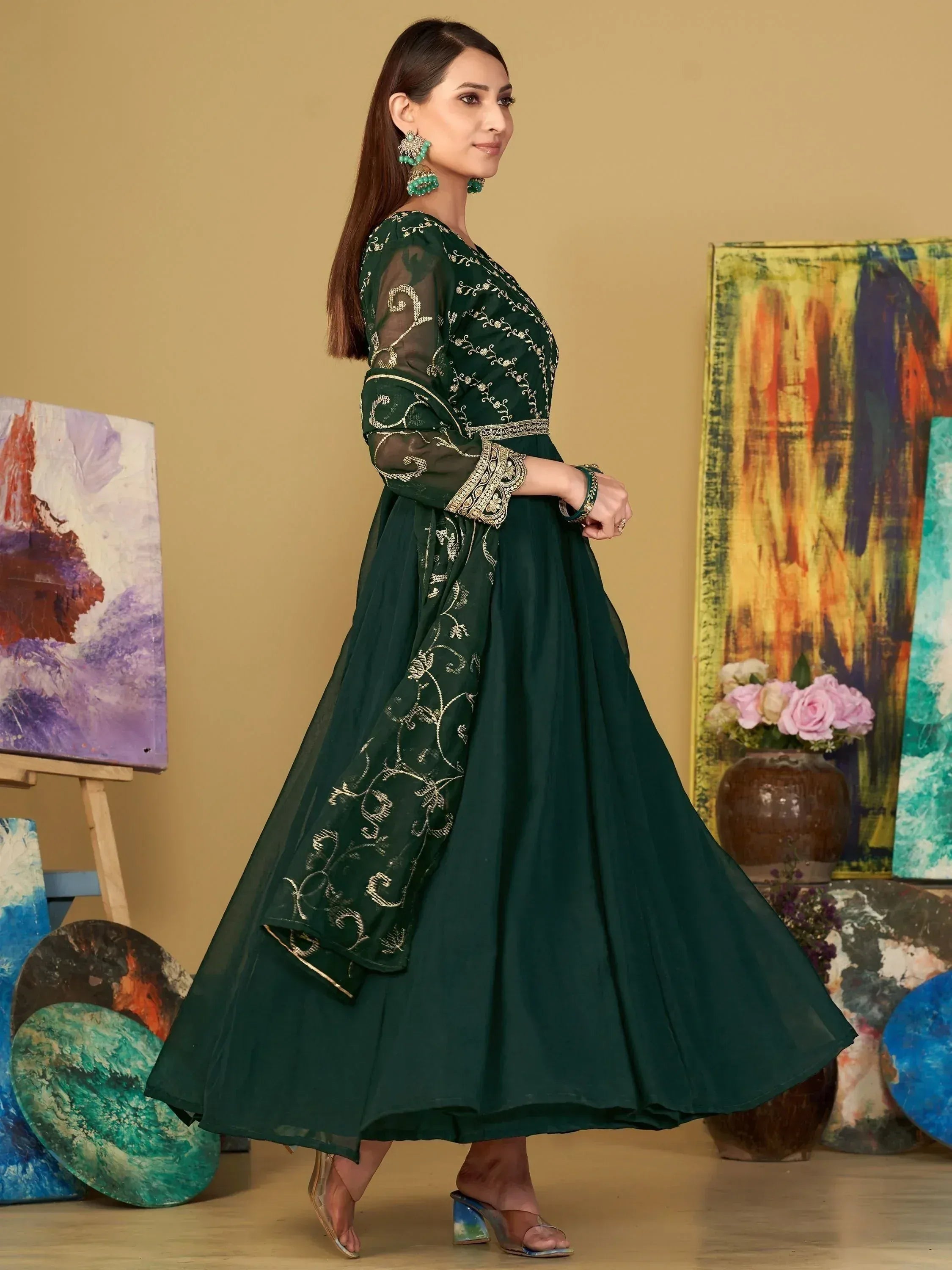 Emerald green embroidered anarkali gown with sheer sleeves, perfect for Indian ethnic occasions