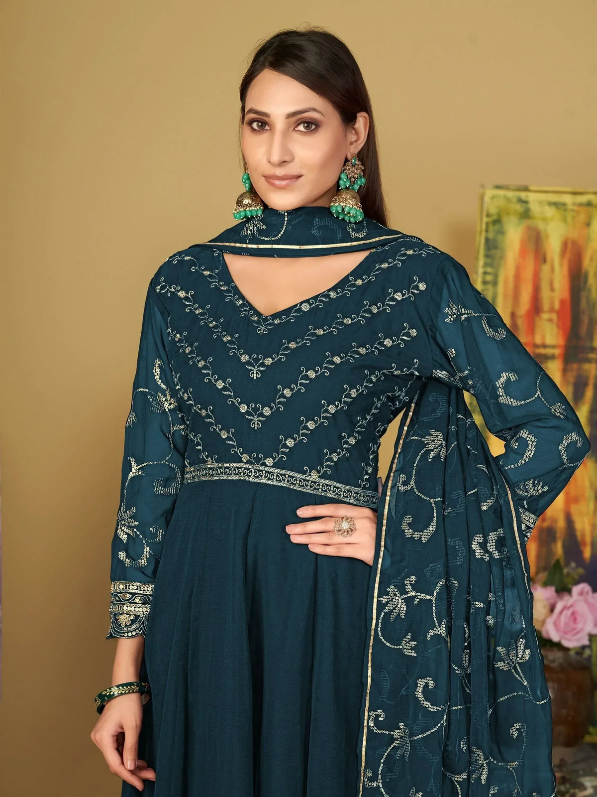 Teal embroidered salwar kameez with gold detailing, perfect for Indian ethnic wear occasions