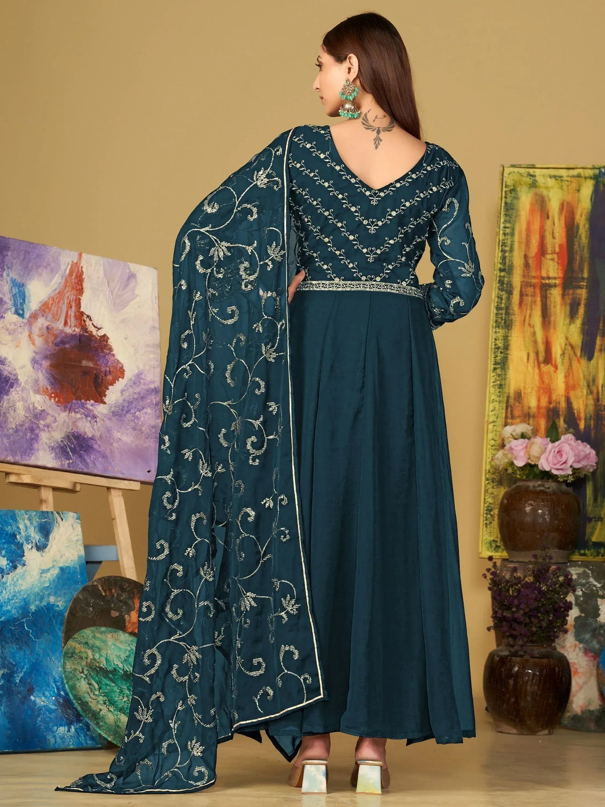 Teal embroidered ethnic gown with floral dupatta, perfect for Indian festive occasions