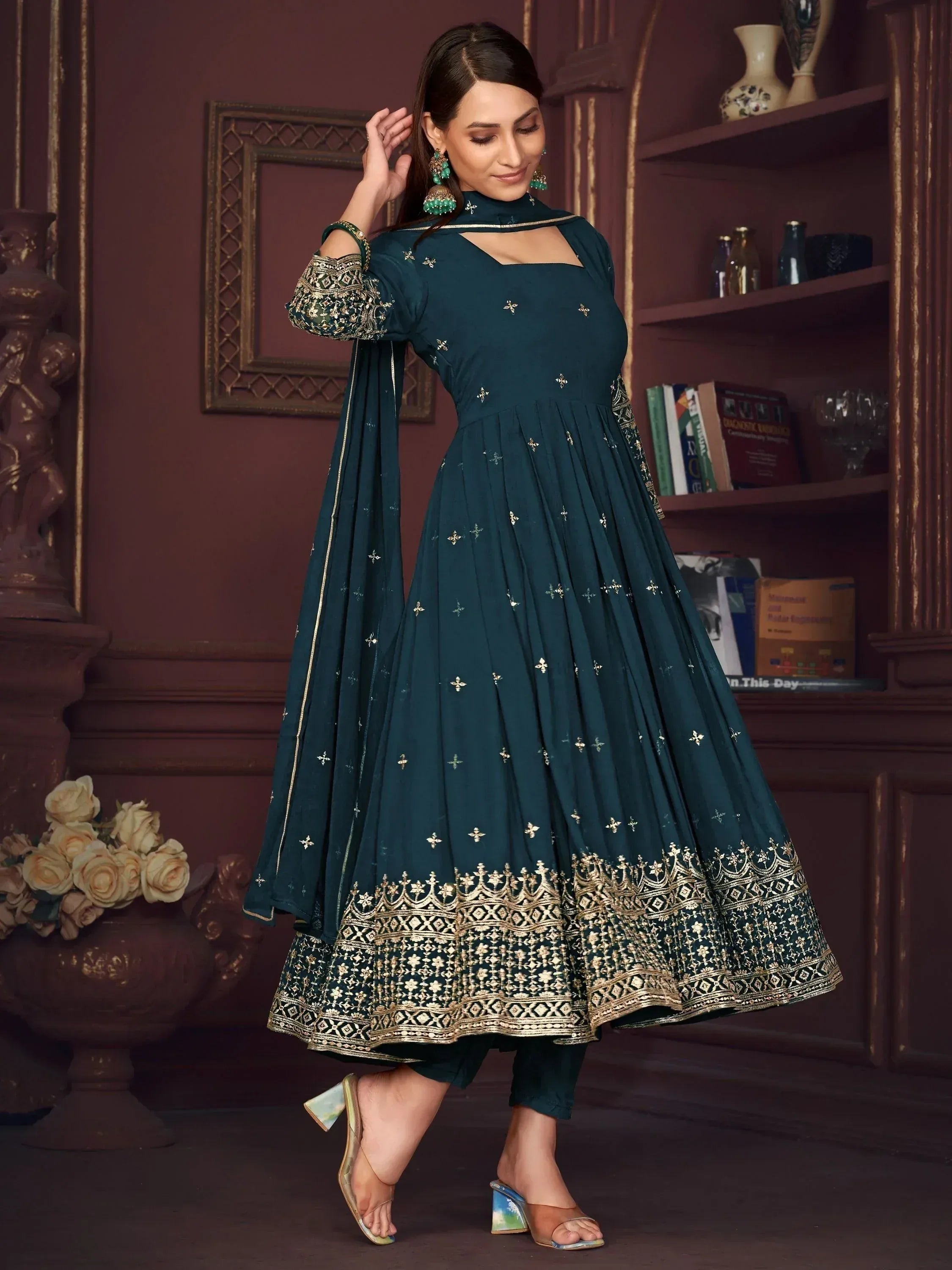 Teal green anarkali suit with gold embroidery, perfect for Indian ethnic wear and festive occasions.